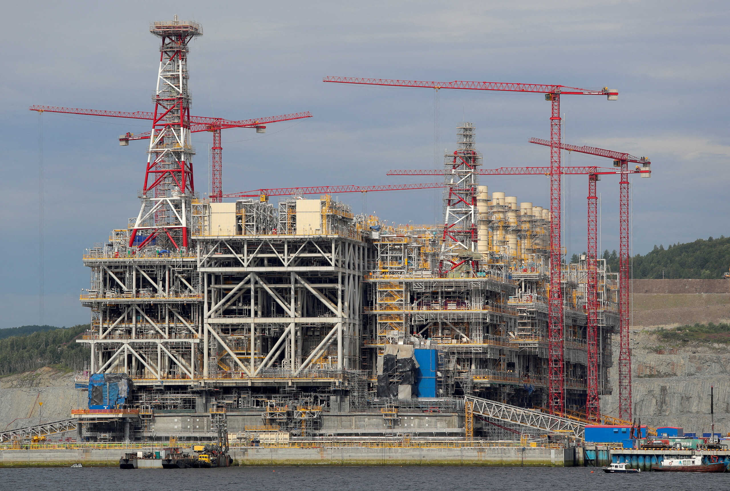 FILE PHOTO: A concrete gravity-based structure (GBS) of Arctic LNG 2 joint venture is seen under construction in a dry dock of the LNG Construction center near the settlement of Belokamenka, Murmansk region, Russia July 26, 2022.  REUTERS