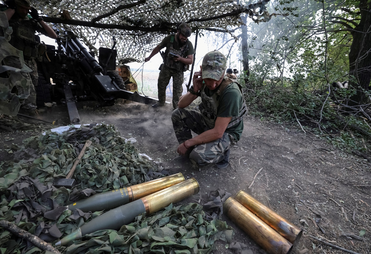 Artillerymen of the 15th Operative Purpose Brigade 'Kara-Dag of the National Guard of Ukraine fire a M101A1 howitzer towards Russian troops at a front line, amid Russia's attack on Ukraine, near Pokrovsk, Donetsk region, Ukraine September 5, 2024. Radio Free Europe