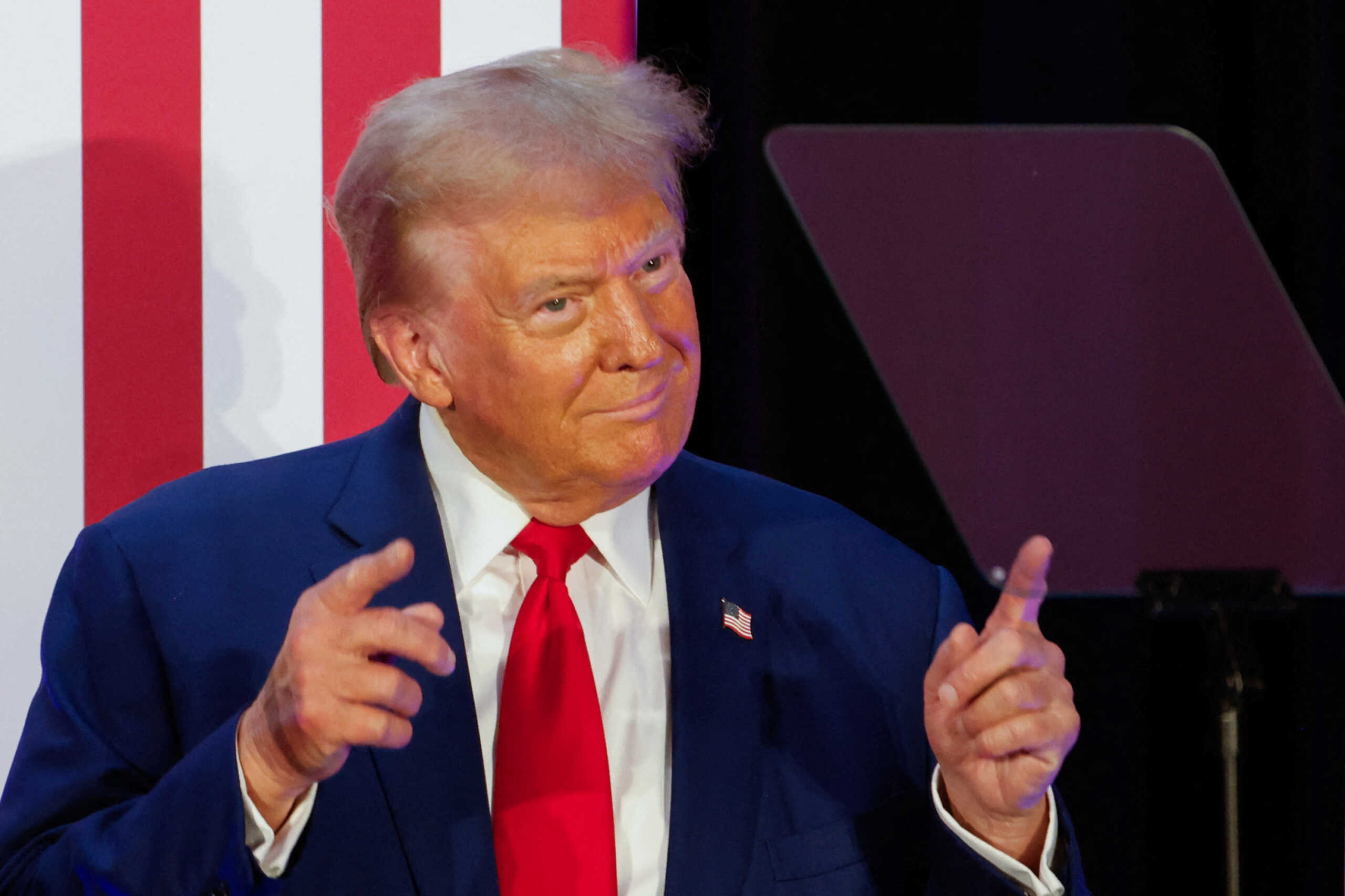 Republican presidential nominee and former U.S. President Donald Trump gestures as he addresses the Fraternal Order of Police at their meeting in Charlotte, North Carolina, U.S. September 6, 2024. REUTERS