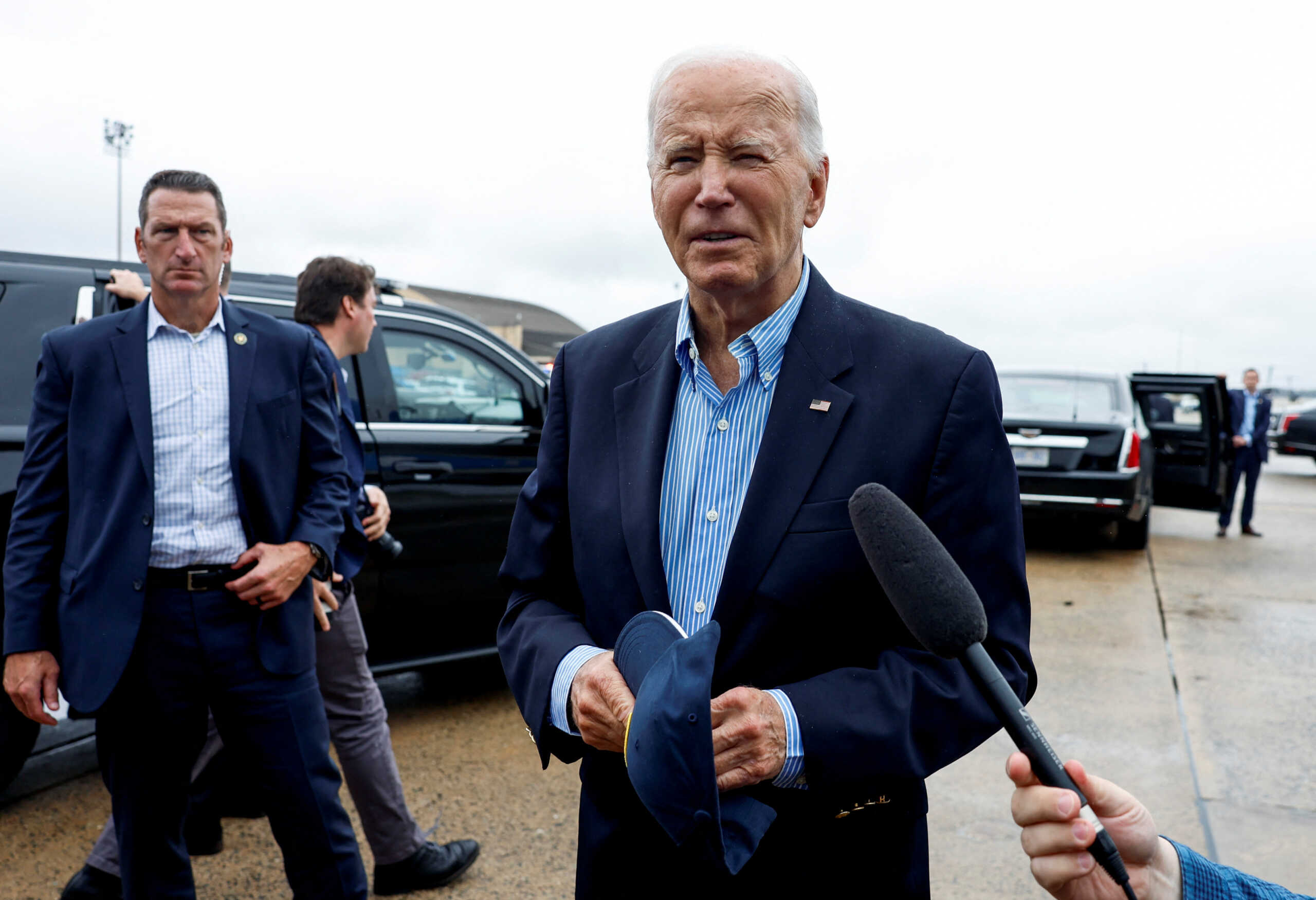 U.S. President Joe Biden speaks to members of the media before boarding Air Force One en route to North and South Carolina, in the wake of Hurricane Helene, at Joint Base Andrews, Maryland, U.S., October 2, 2024. REUTERS