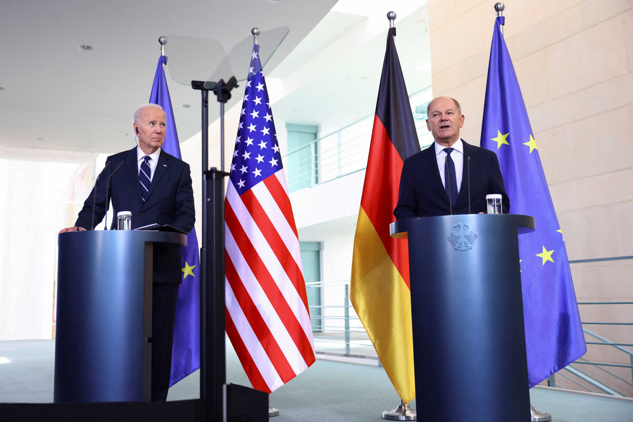 German Chancellor Olaf Scholz gives a statement next to U.S. President Joe Biden at the Chancellery in Berlin, Germany, October 18, 2024. REUTERS