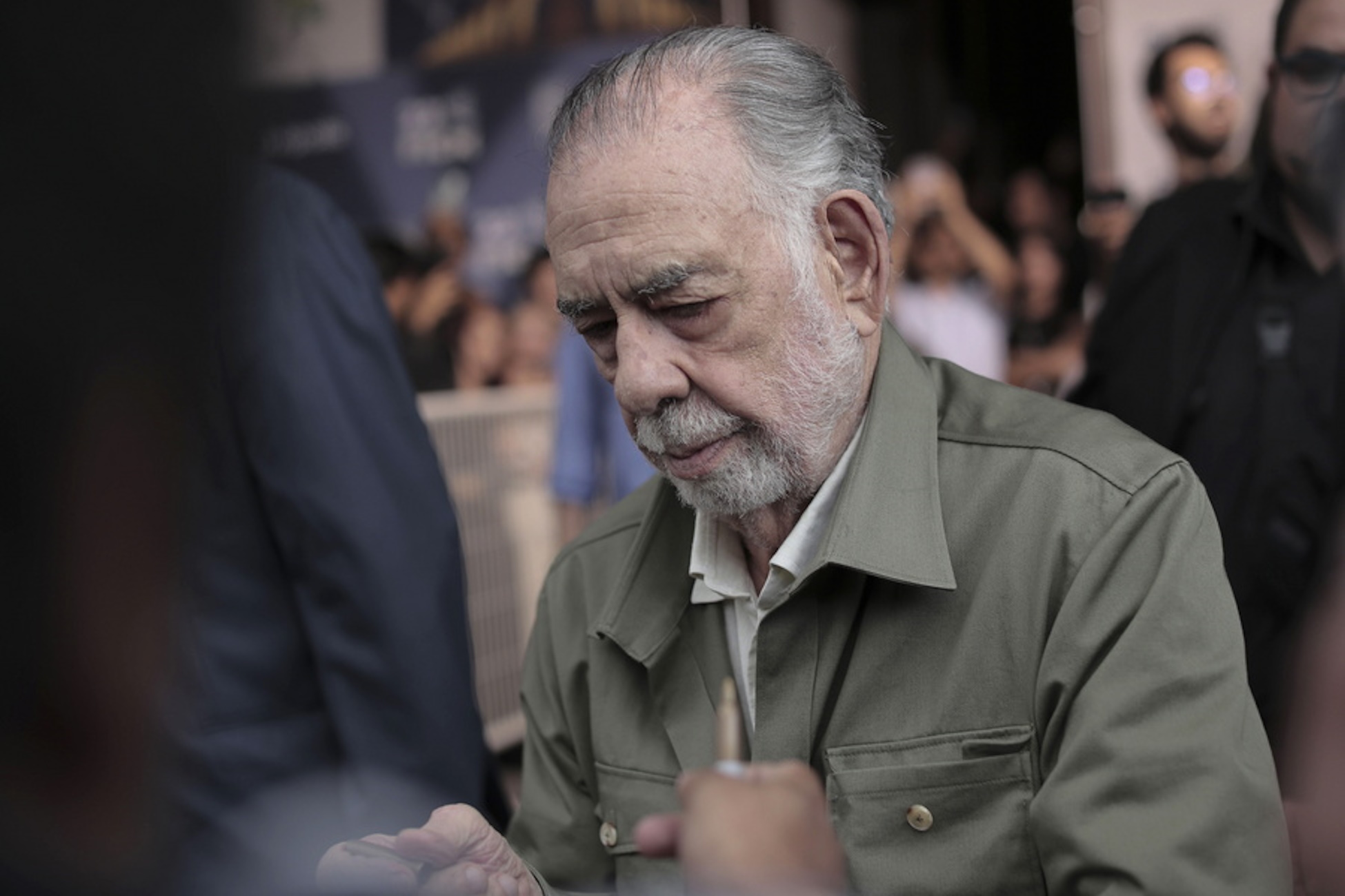 epa11675627 US film director Francis Ford Coppola signs autographs during the 22nd edition of the Morelia International Film Festival (FICM), in Morelia, Michoacan state, Mexico, 21 October 2024 (issued 22 October 2024). Coppola presented his new movie 'Megalopolis'.  EPA