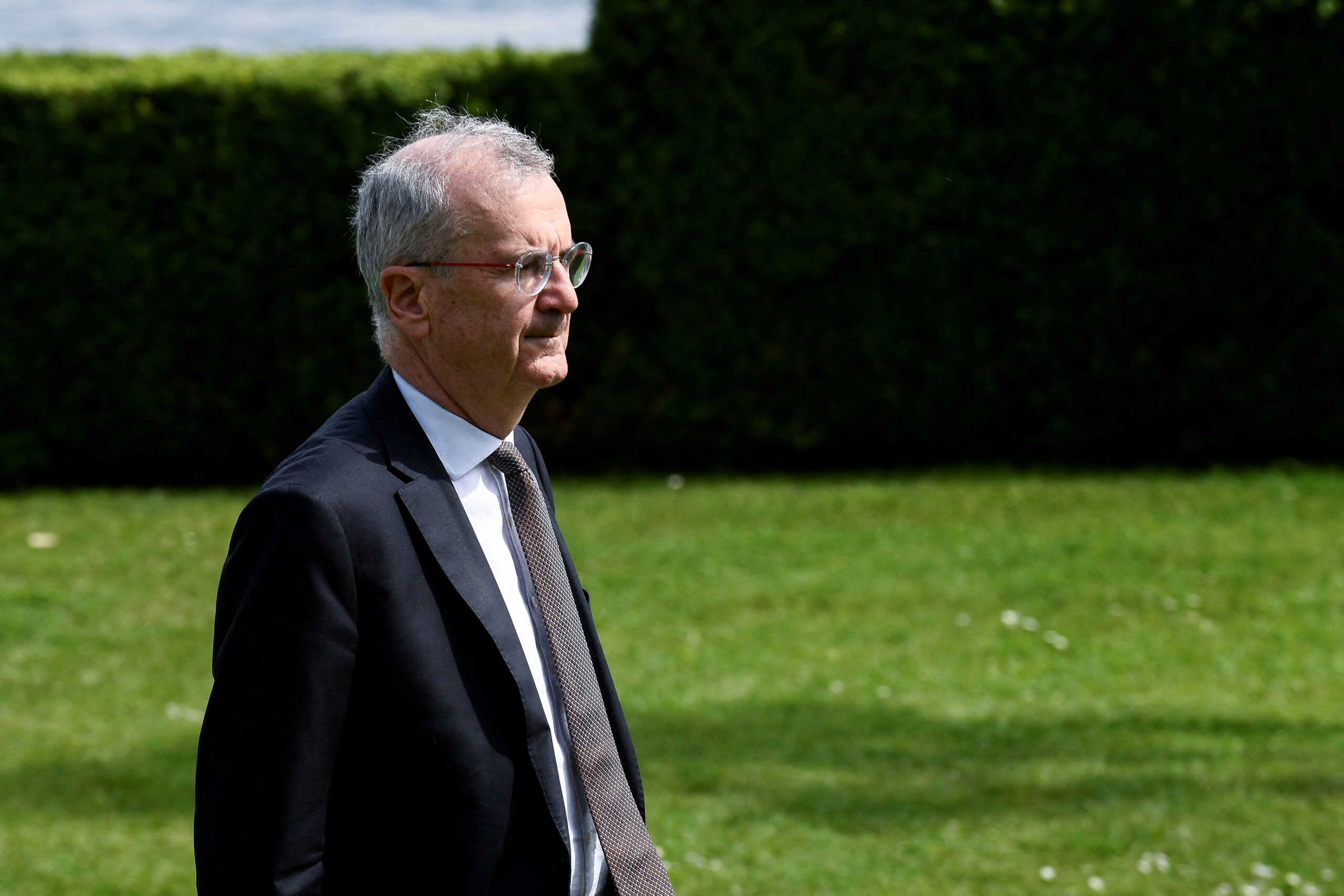 FILE PHOTO: Bank of France Governor Francois Villeroy de Galhau walks on the final day of the G7 Finance Ministers and Central Bank Governors' Meeting in Stresa, Italy May 25, 2024. REUTERS