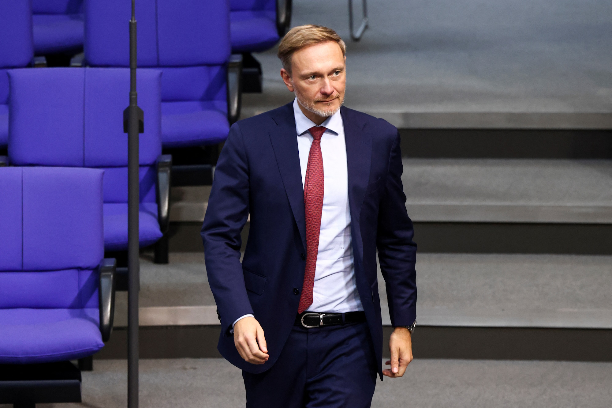 Germany's Finance Minister Christian Lindner walks on the day of a session of the lower house of parliament Bundestag, in Berlin, Germany, October 16, 2024. REUTERS