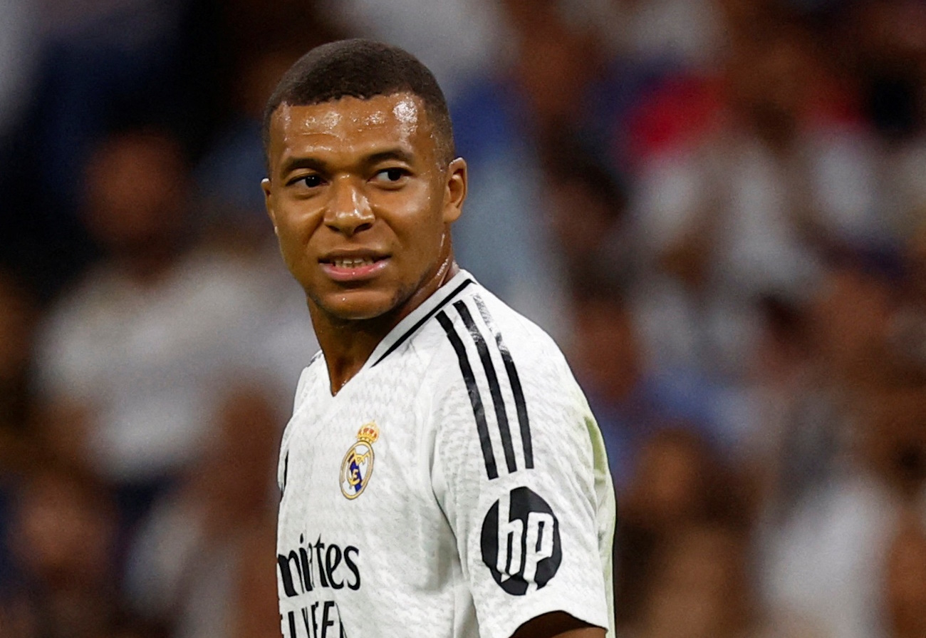 FILE PHOTO: Soccer Football - LaLiga - Real Madrid v Real Betis - Santiago Bernabeu, Madrid, Spain - September 1, 2024  Real Madrid's Kylian Mbappe reacts REUTERS