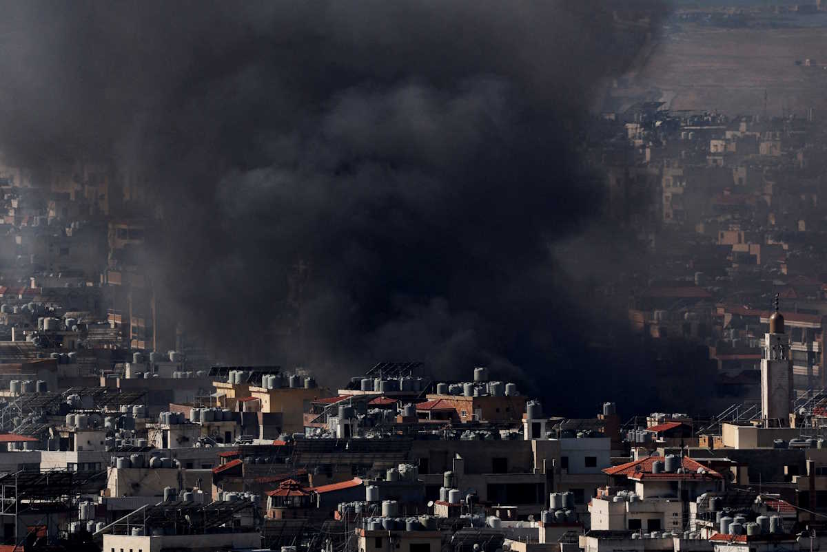 Smoke rises over Dahieh in Beirut's southern suburbs, after overnight Israeli air strikes, amid ongoing hostilities between Hezbollah and Israeli forces, as seen from Sin El Fil, Lebanon, October 3, 2024. REUTERS