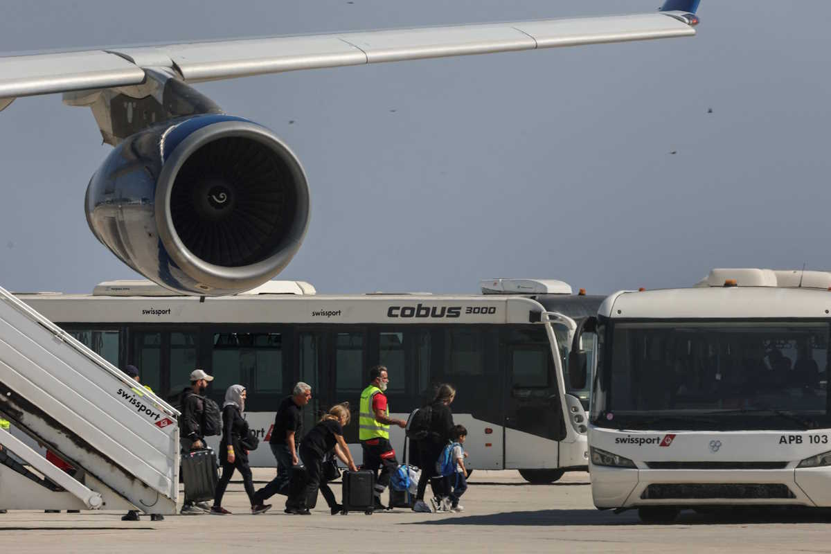 Australian nationals evacuated from Lebanon, due to ongoing hostilities between Hezbollah and the Israeli forces, arrive at Larnaca International Airport, in Cyprus, October 7, 2024. REUTERS