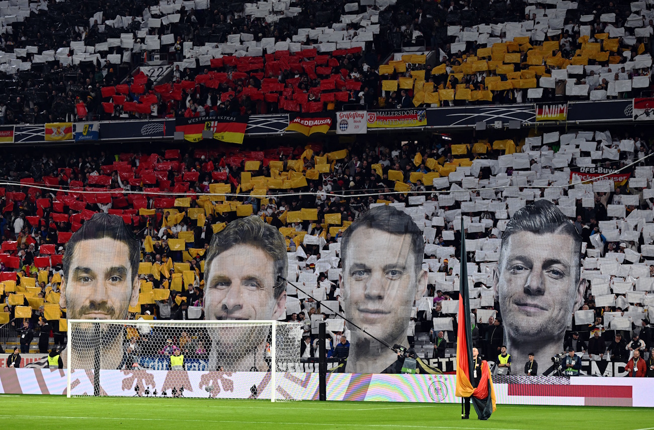 Soccer Football - UEFA Nations League - Group A3 - Germany v Netherlands - Allianz Arena, Munich, Germany - October 14, 2024 General view as fans display images of Germany's Ilkay Gundogan, Thomas Muller, Manuel Neuer and Toni Kroos in the stands before the match REUTERS