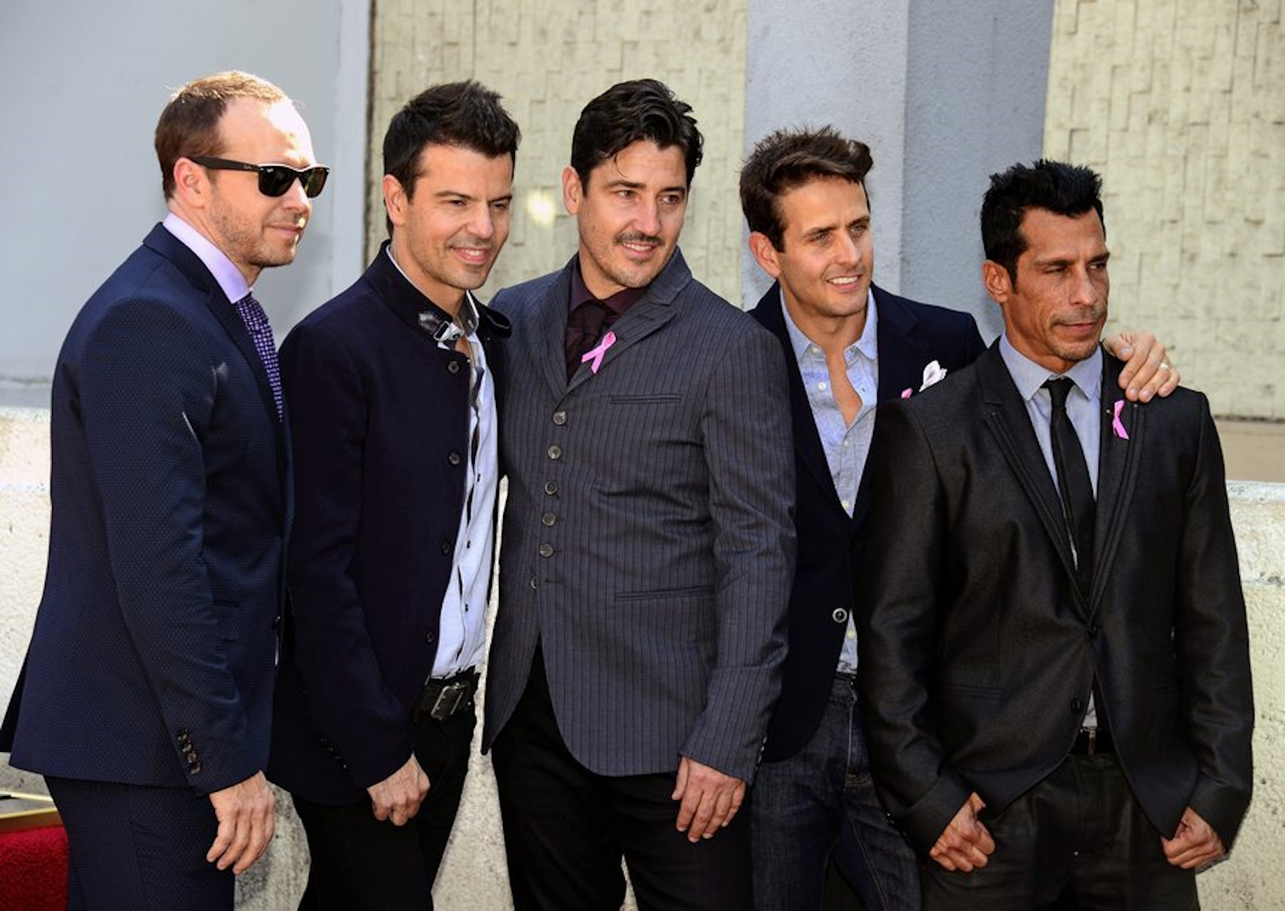 epa04438970 Members of the original US boy band 'New Kids On The Block' (L-R) Donnie Wahlberg, Jordan Knight, Jonathan Knight, Joey McIntyre and Danny Wood pose during their star ceremony on the Hollywood Walk of Fame, in Hollywood, California, USA, 09 October 2014. This is the 2,530th star on the Hollywood Walk of Fame in the category of Recording.  EPA