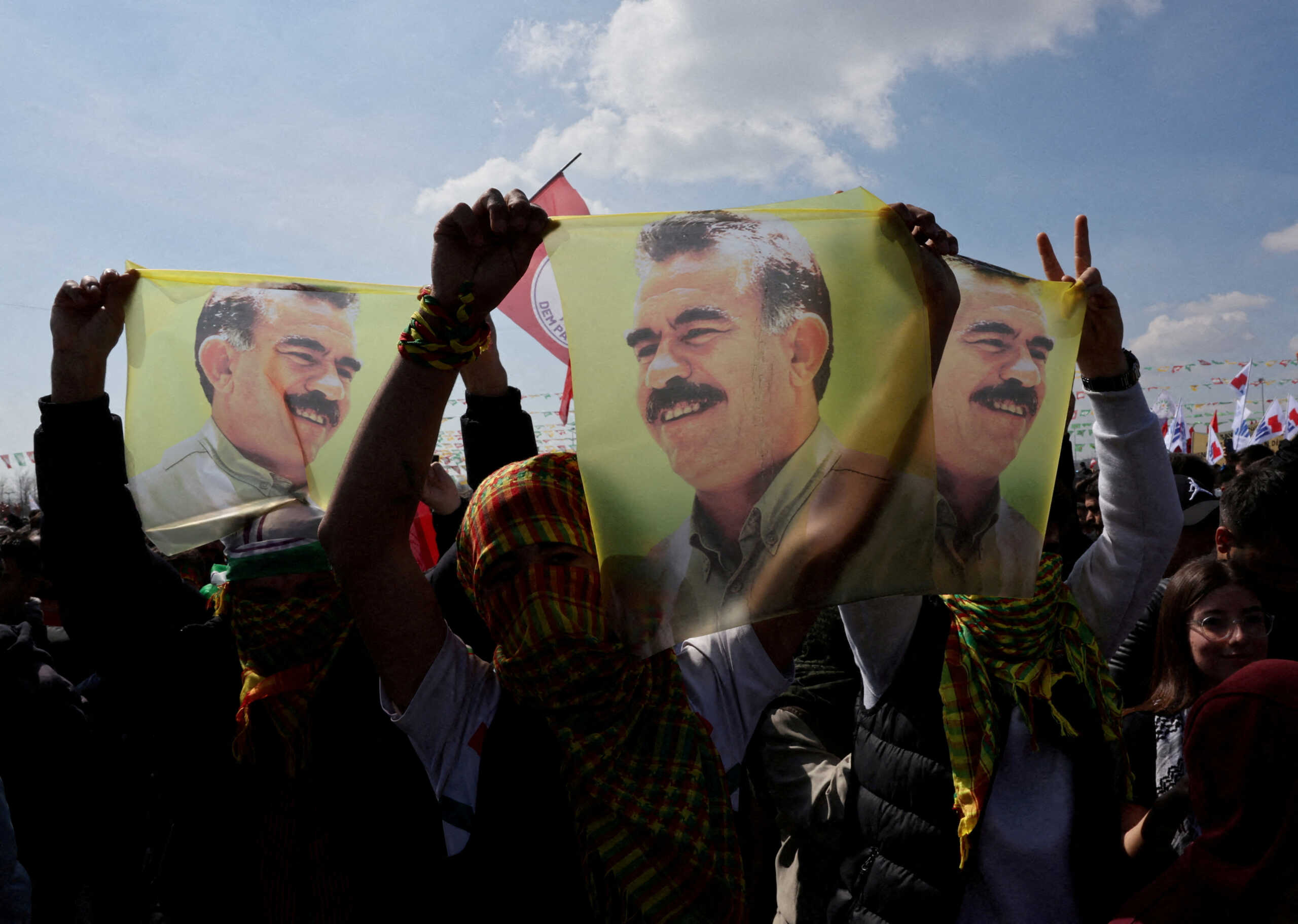 FILE PHOTO: Supporters of pro-Kurdish Peoples' Equality and Democracy Party (DEM Party) display flags with a portrait of jailed Kurdistan Workers Party (PKK) leader Abdullah Ocalan, during a rally to celebrate Nowruz, which marks the arrival of spring, in Istanbul, Turkey, March 17, 2024. REUTERS