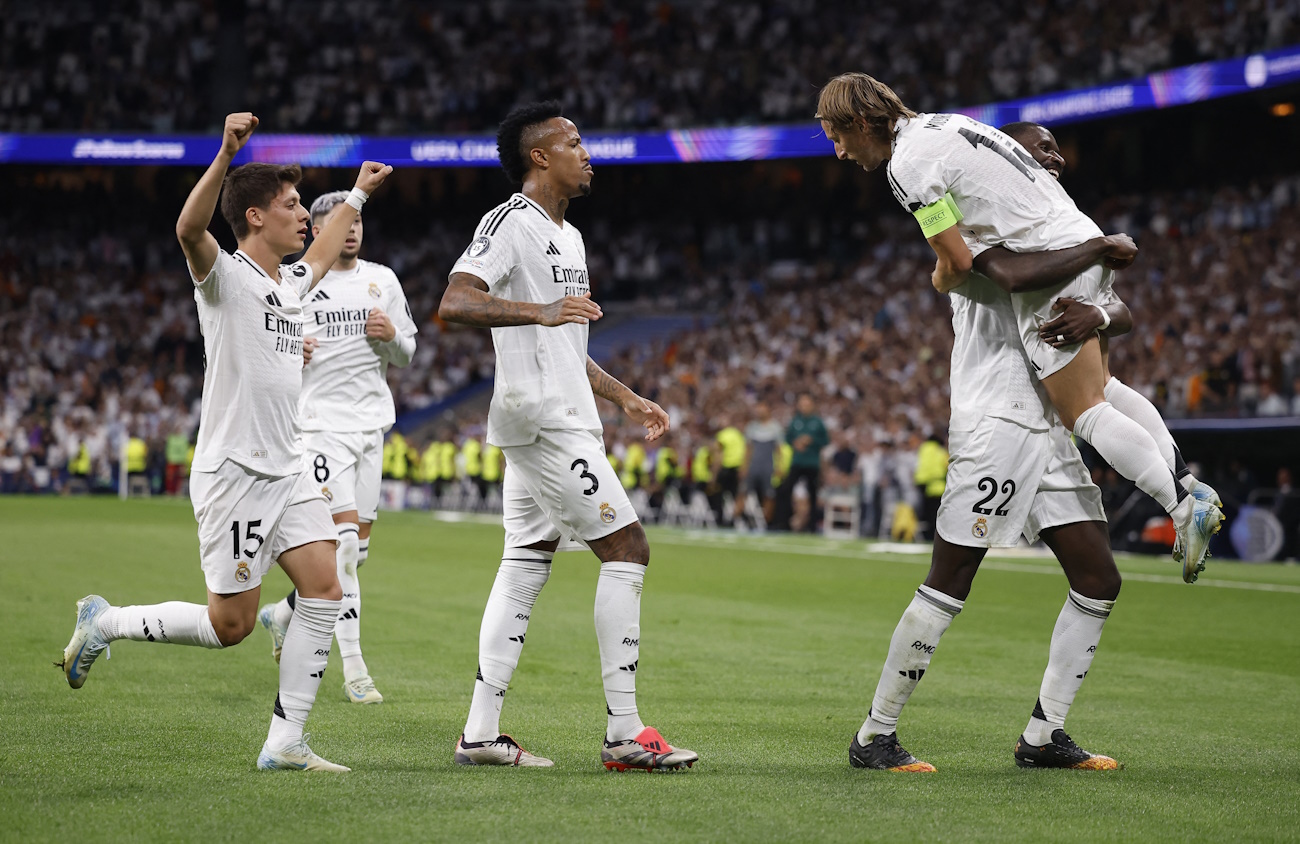 Soccer Football - Champions League - Real Madrid v VfB Stuttgart - Santiago Bernabeu, Madrid, Spain - September 17, 2024 Real Madrid's Antonio Rudiger celebrates scoring their second goal with Luka Modric, Eder Militao and Arda Guler REUTERS