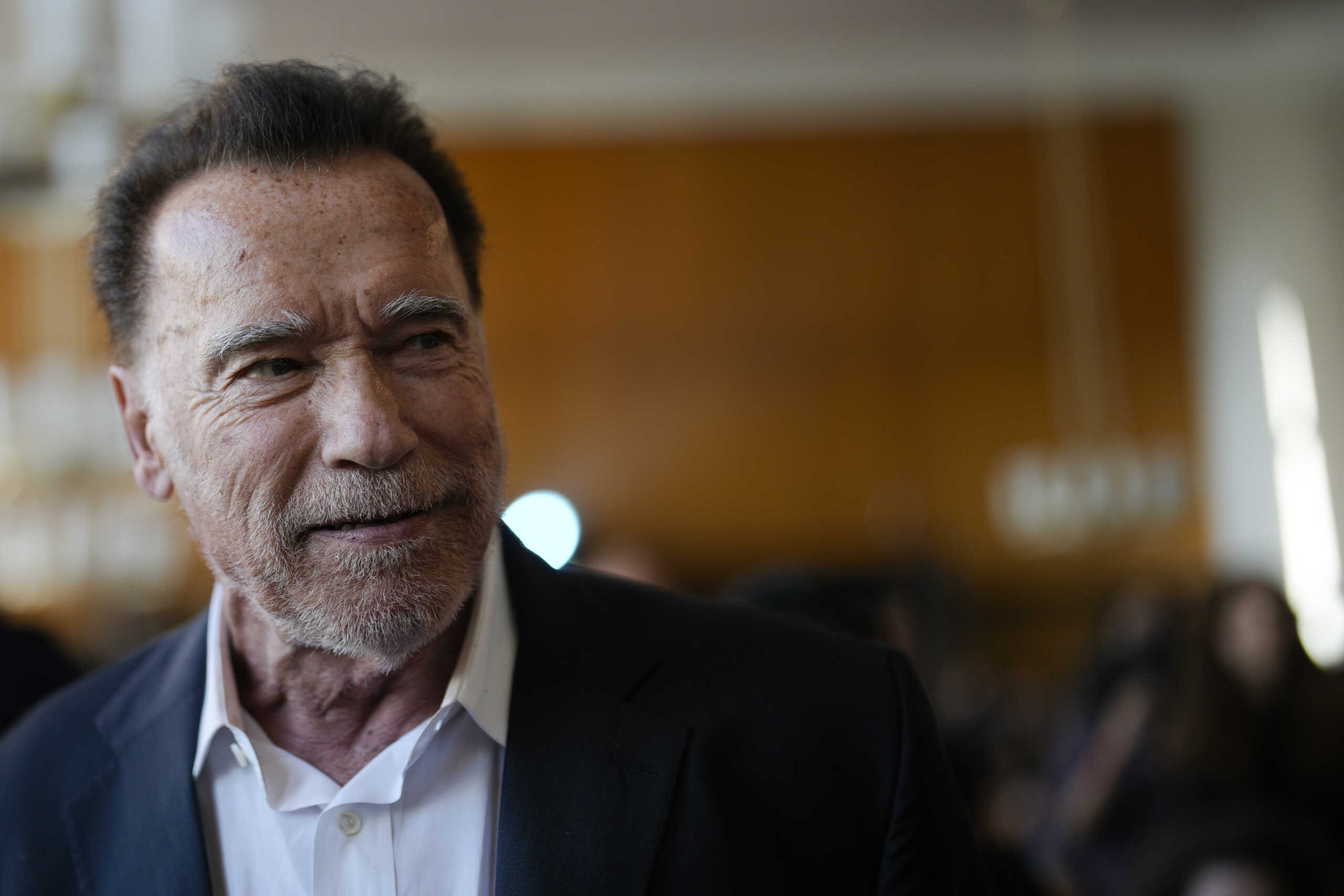 Former California Governor and actor Arnold Schwarzenegger arrives for a ceremony to receive a honorary doctorate by the Hertie School, a university of governance, in Berlin, Germany, Tuesday, Sept. 17, 2024. (AP Photo