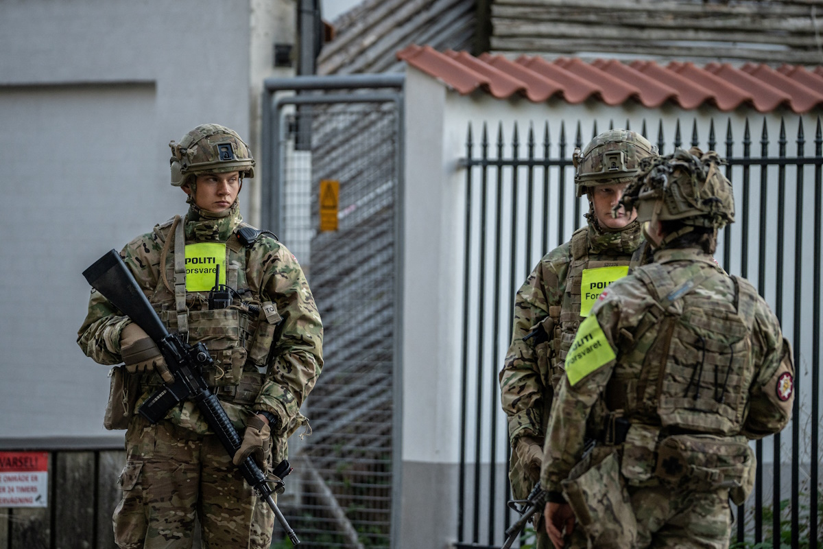 Security personnel stand during investigation of two blasts near the Israeli embassy in Copenhagen, Denmark, October 2, 2024. Emil Nicolai Helms