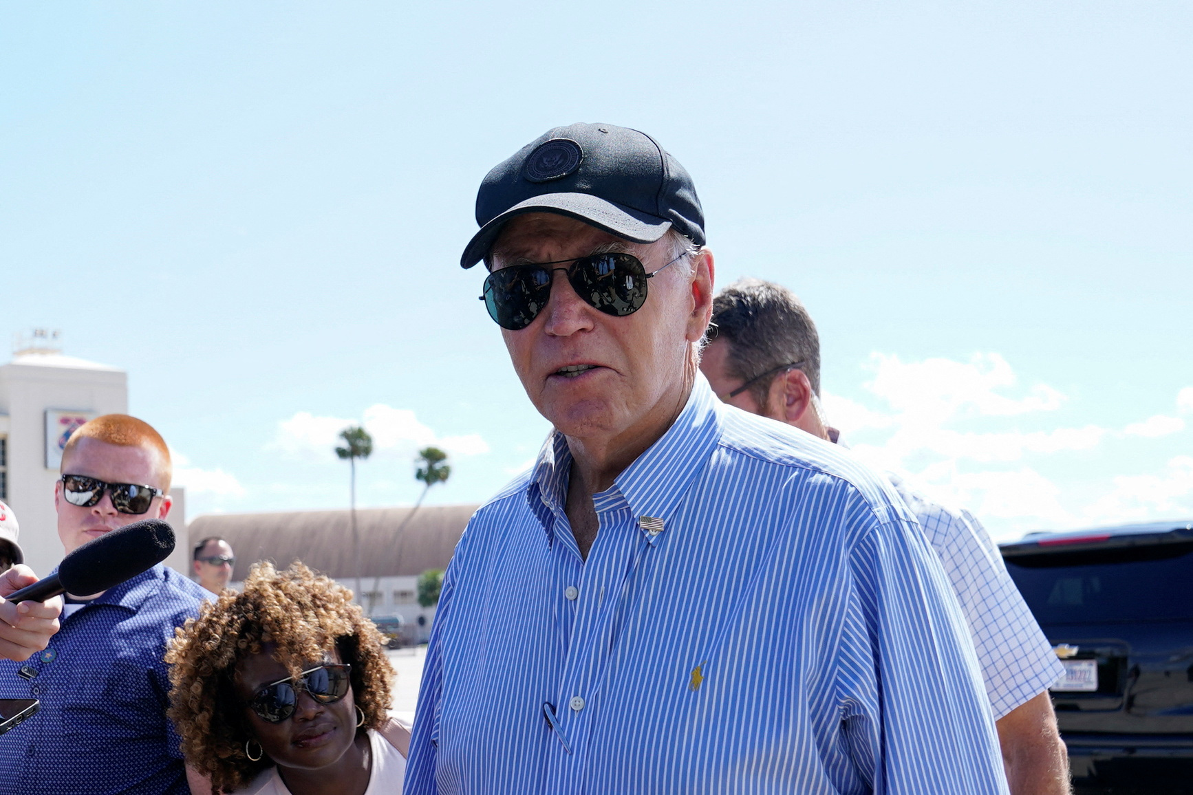 U.S. President Joe Biden speaks to reporters before boarding Air Force One after visiting storm-damaged areas in the wake of Hurricanes Milton and Helene, at MacDill Air Force Base in Tampa, Florida, U.S., October 13, 2024. REUTERS