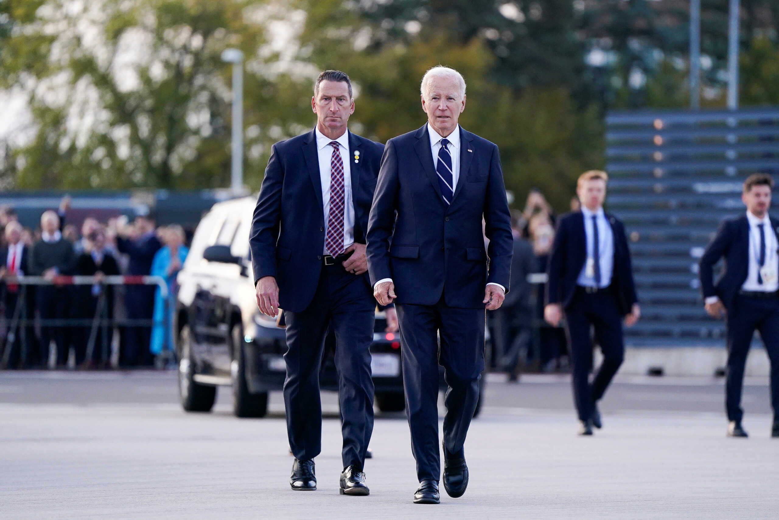 U.S. President Joe Biden walks towards Air Force One to board, at Berlin-Brandenburg Airport, Berlin, Germany, October 18, 2024. REUTERS