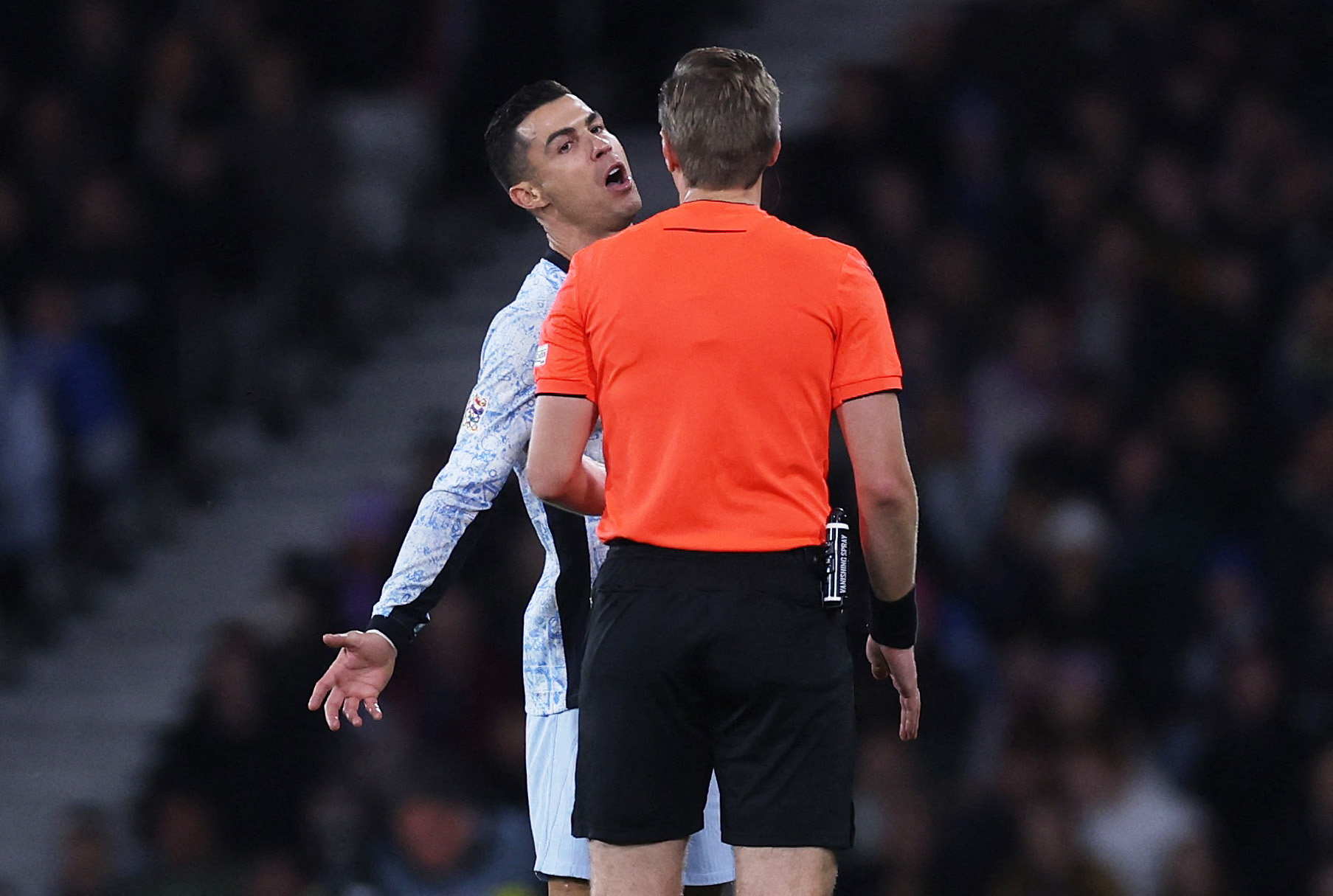 Soccer Football - UEFA Nations League - Group A1 - Scotland v Portugal - Hampden Park, Glasgow, Scotland, Britain - October 15, 2024 Portugal's Cristiano Ronaldo reacts with referee Lawrence Visser Action Images via Reuters