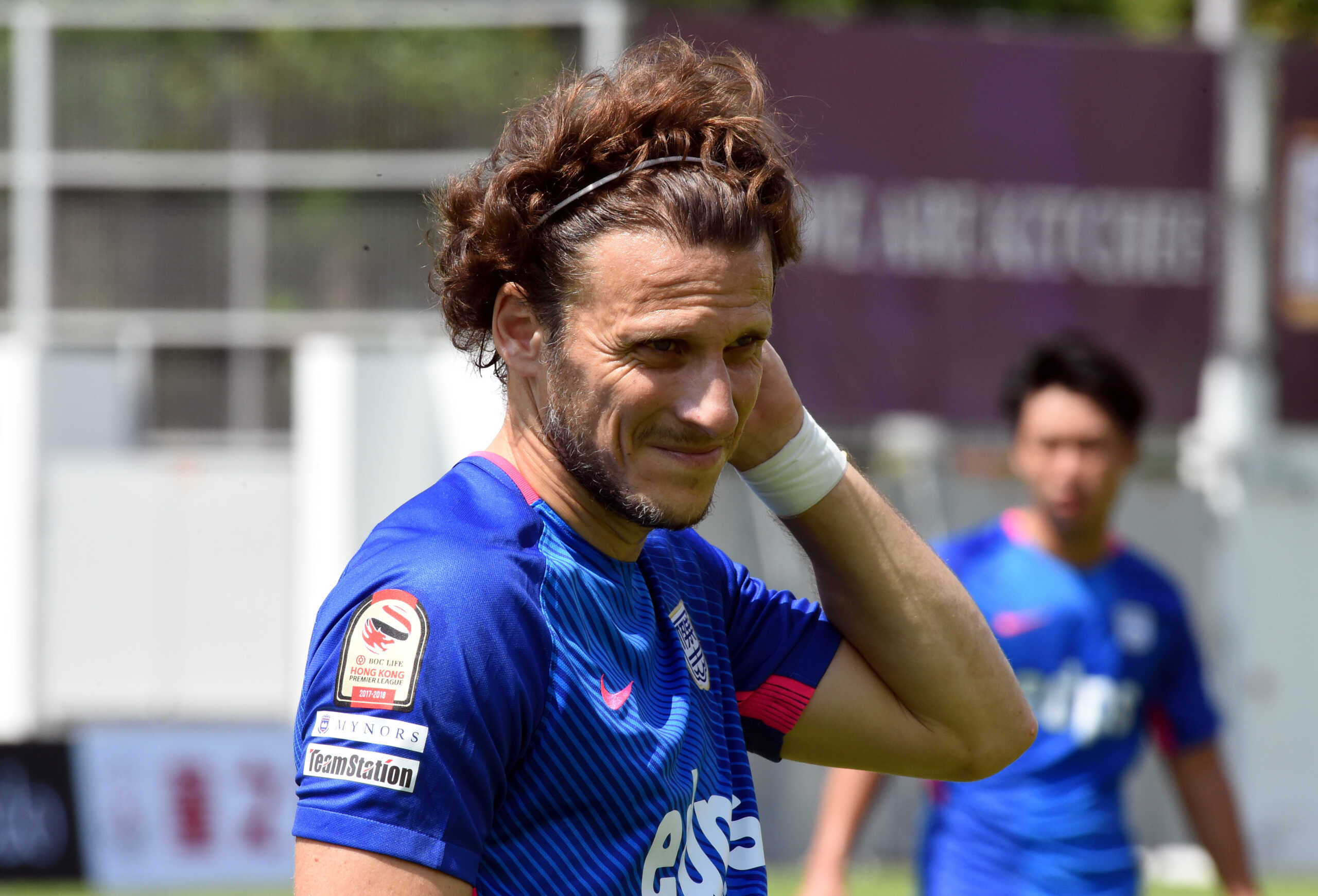 Uruguayan football player Diego Forlan, center, of Hong Kong's Kitchee SC, celebrates after defeating Yuen Long FC in the Hong Kong Premier League in Hong Kong, China, 13 May 2018.  (Imaginechina via AP Images)