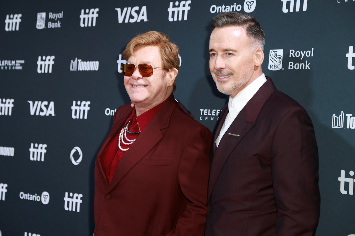 Elton John and director David Furnish pose on the red carpet before "Elton John: Never Too Late" is screened, as the Toronto International Film Festival (TIFF) returns for its 49th edition, in Toronto, Ontario, Canada, September 6, 2024. REUTERS