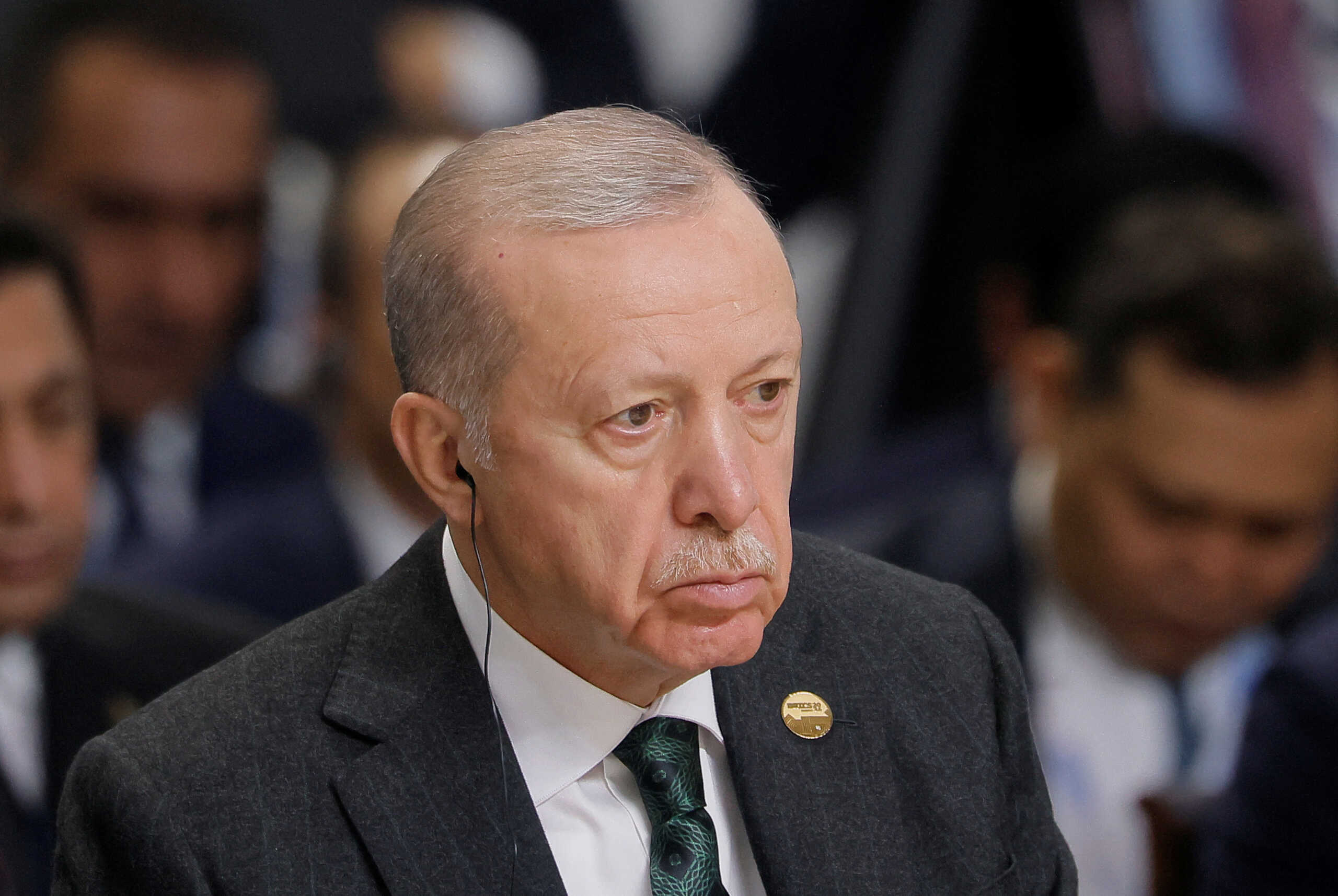 Turkish President Recep Tayyip Erdogan attends a plenary session in the outreach