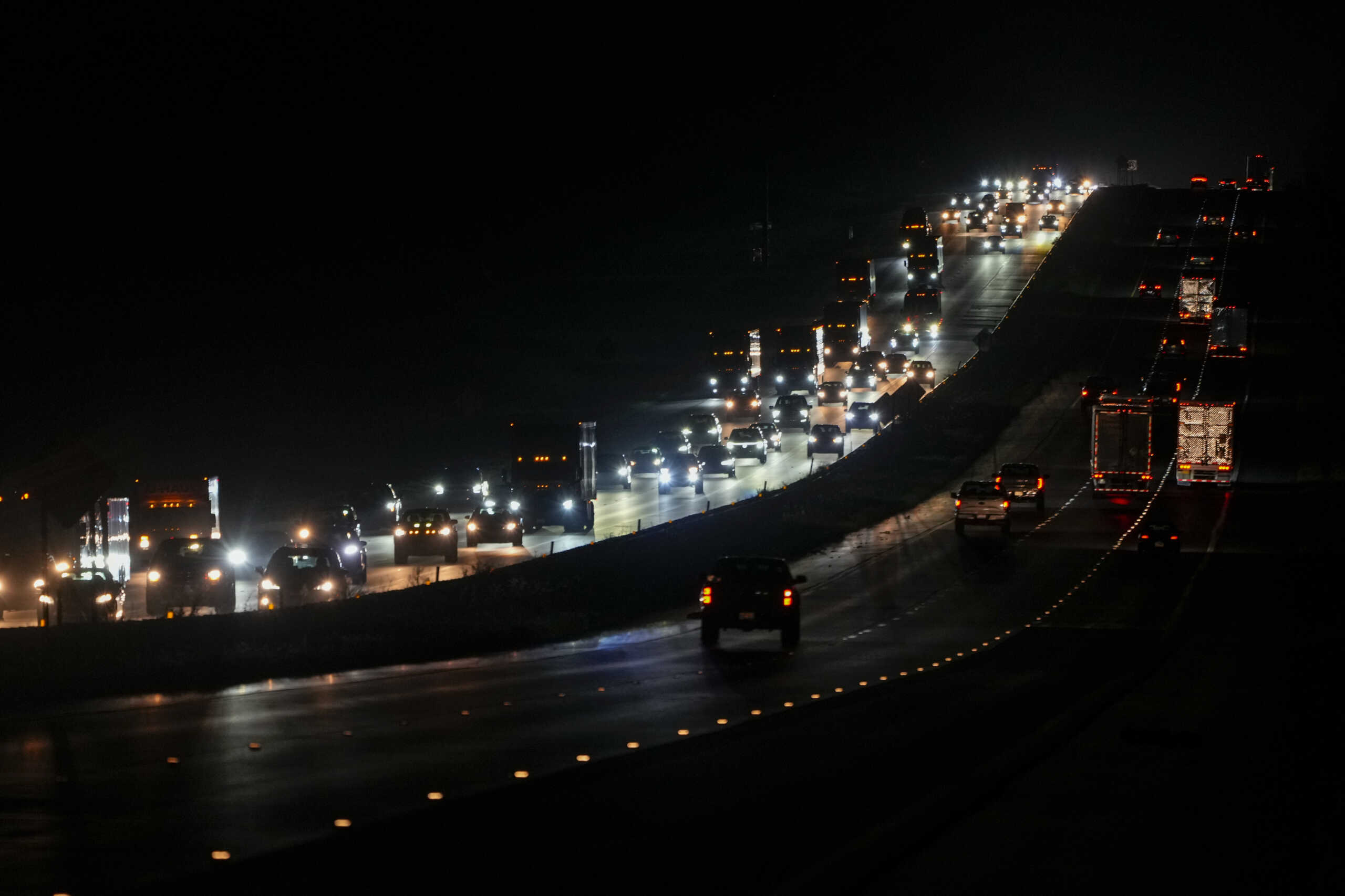 Heavy traffic flows northbound on Interstate-75 as people evacuate the Tampa Bay area ahead of Hurricane Milton's arrival late Monday, Oct. 7, 2024, in Ocala, Fla. (AP Photo