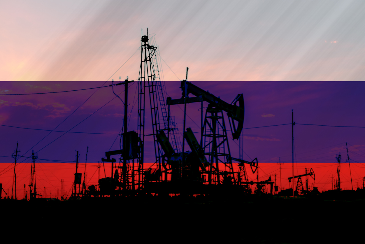 Sanctions on Russian crude oil and gas banSanctions on Russian crude oil and gas ban, oil fields with Russian flag in the background