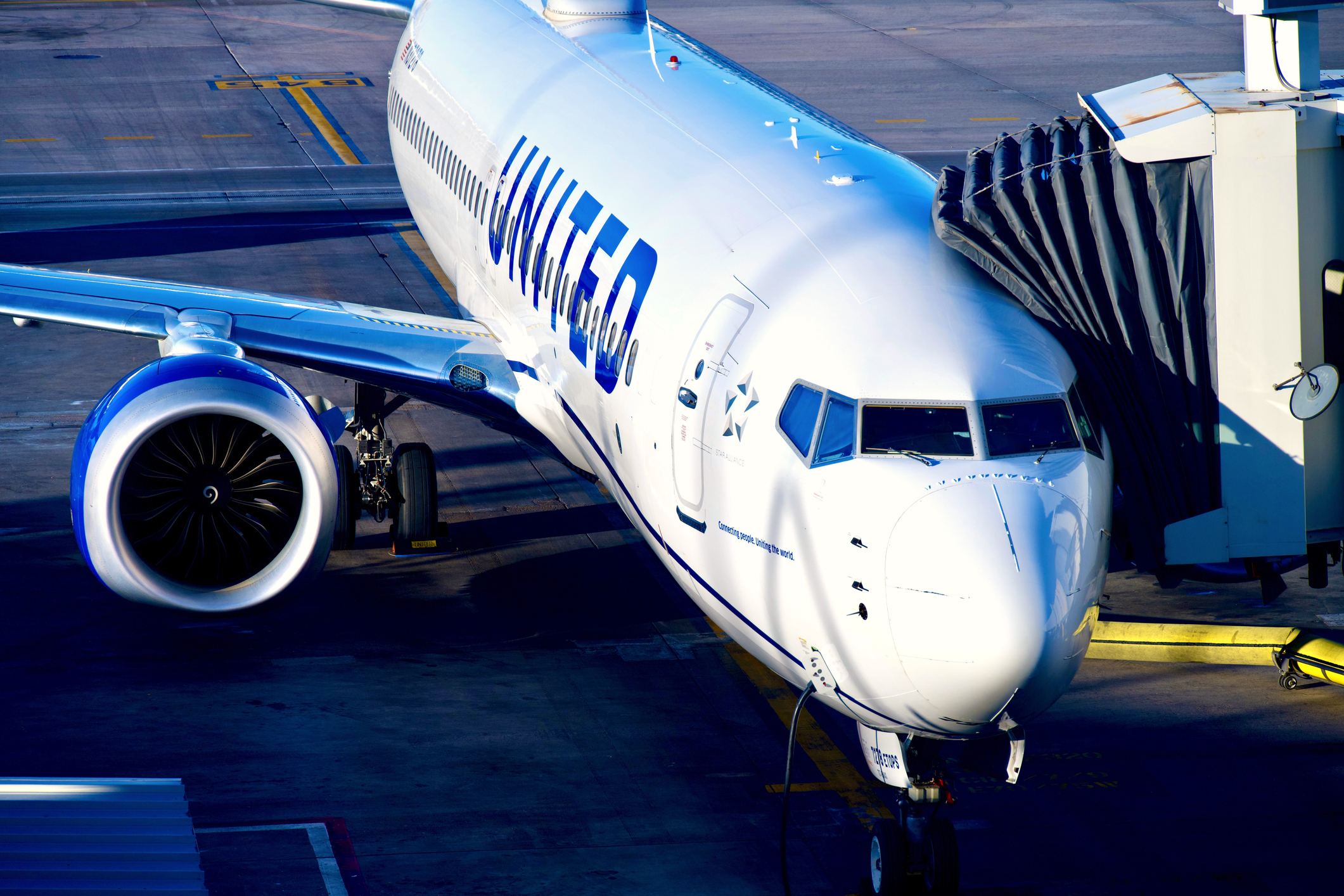 Denver, Colorado (USA) - February 13, 2024: A United Airlines Boeing 737 Max 8 aircraft is parked at a Denver International Airport gate prior to flight UA2613’s departure to New York.