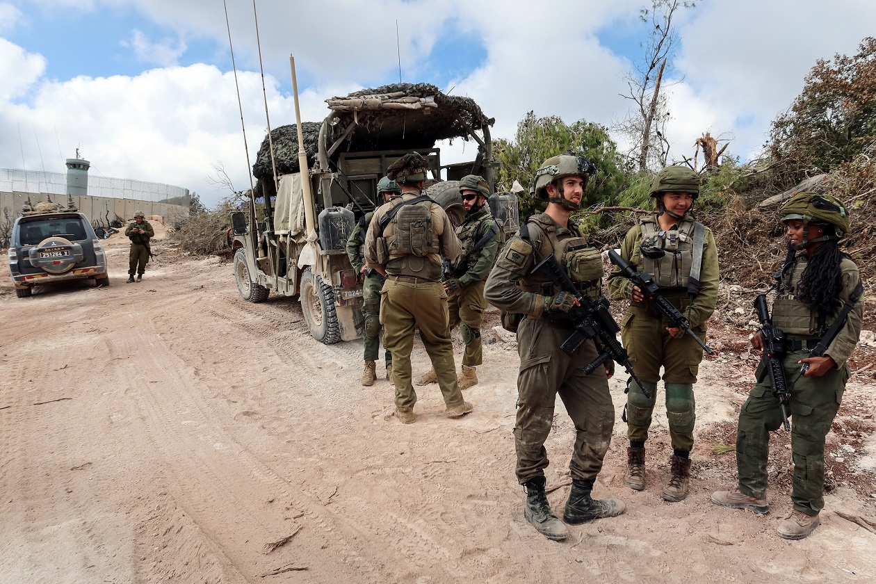 Israeli soldiers operate during an incursion and amid hostilities between Hezbollah and Israel, in southern Lebanon, October 13, 2024. REUTERS