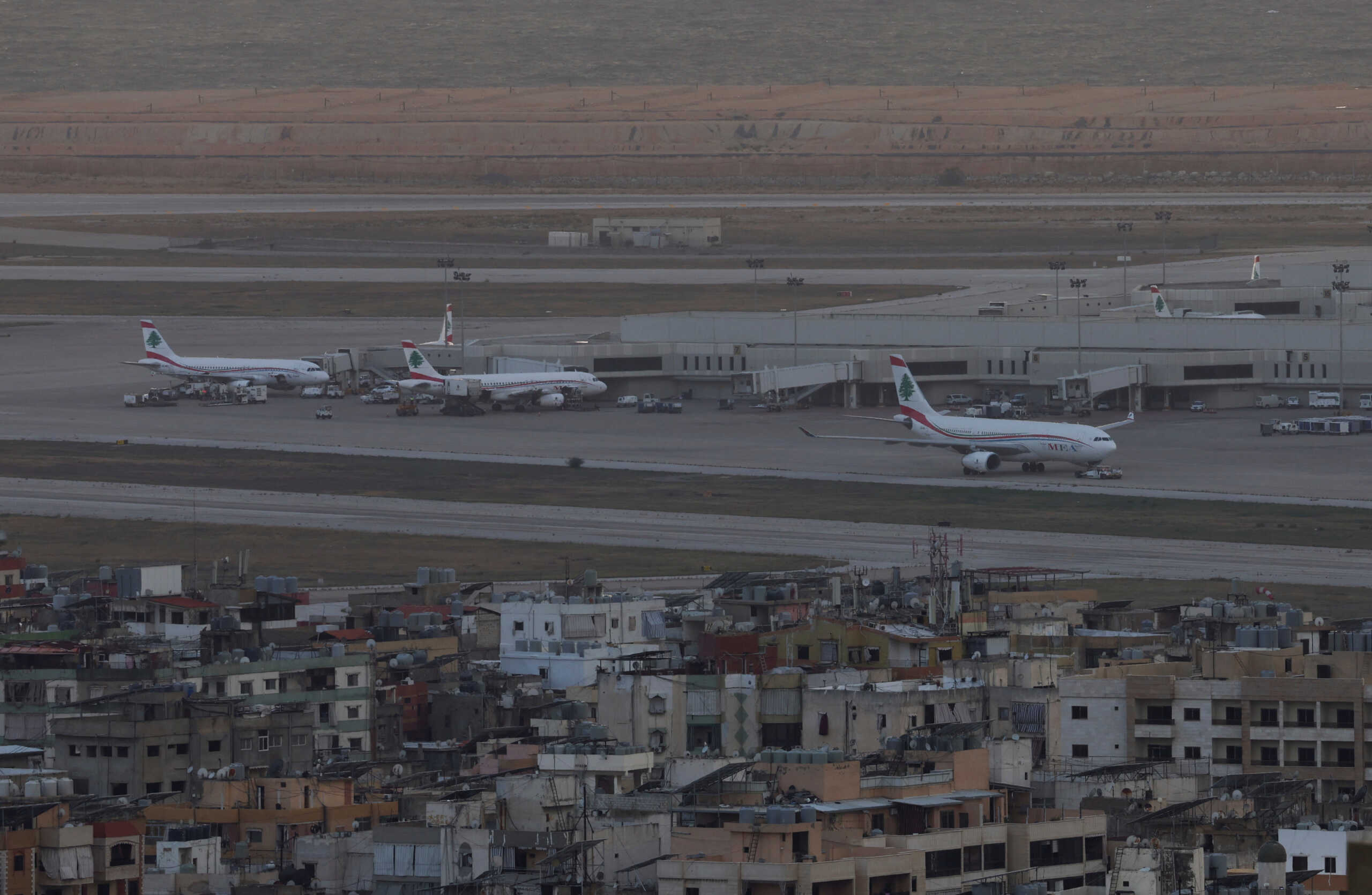 Lebanese Middle East Airlines (MEA) planes are pictured at the tarmac of Beirut-Rafic Al Hariri International Airport, as pictured from Hadath, Lebanon October 1, 2024. REUTERS