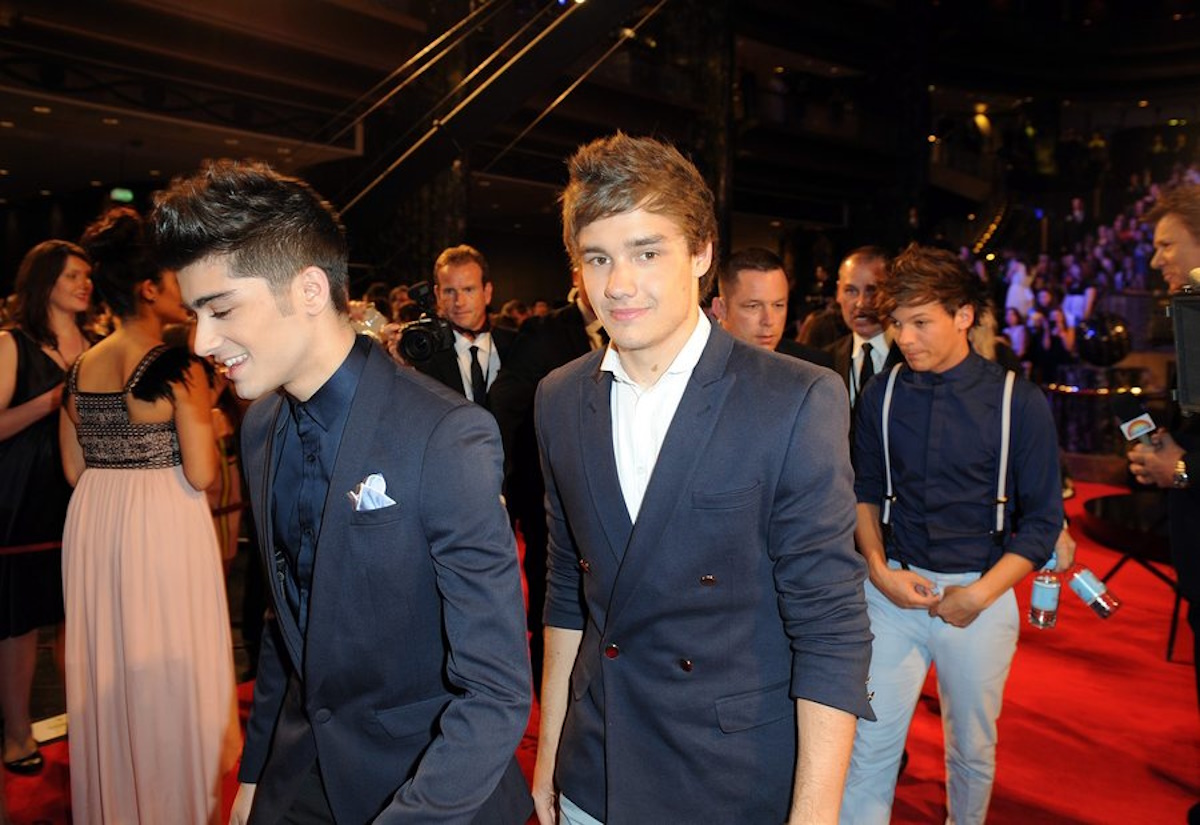 epa03183298 British-Irish boy band One Direction members (L-R) Zayn Malik, Liam Payne, and Louis Tomlinson arrive on the red carpet at the 54th Annual Logie Awards in Melbourne, Australia, 15 April 2012. The Logie Awards celebrate the Australian television industry.  EPA