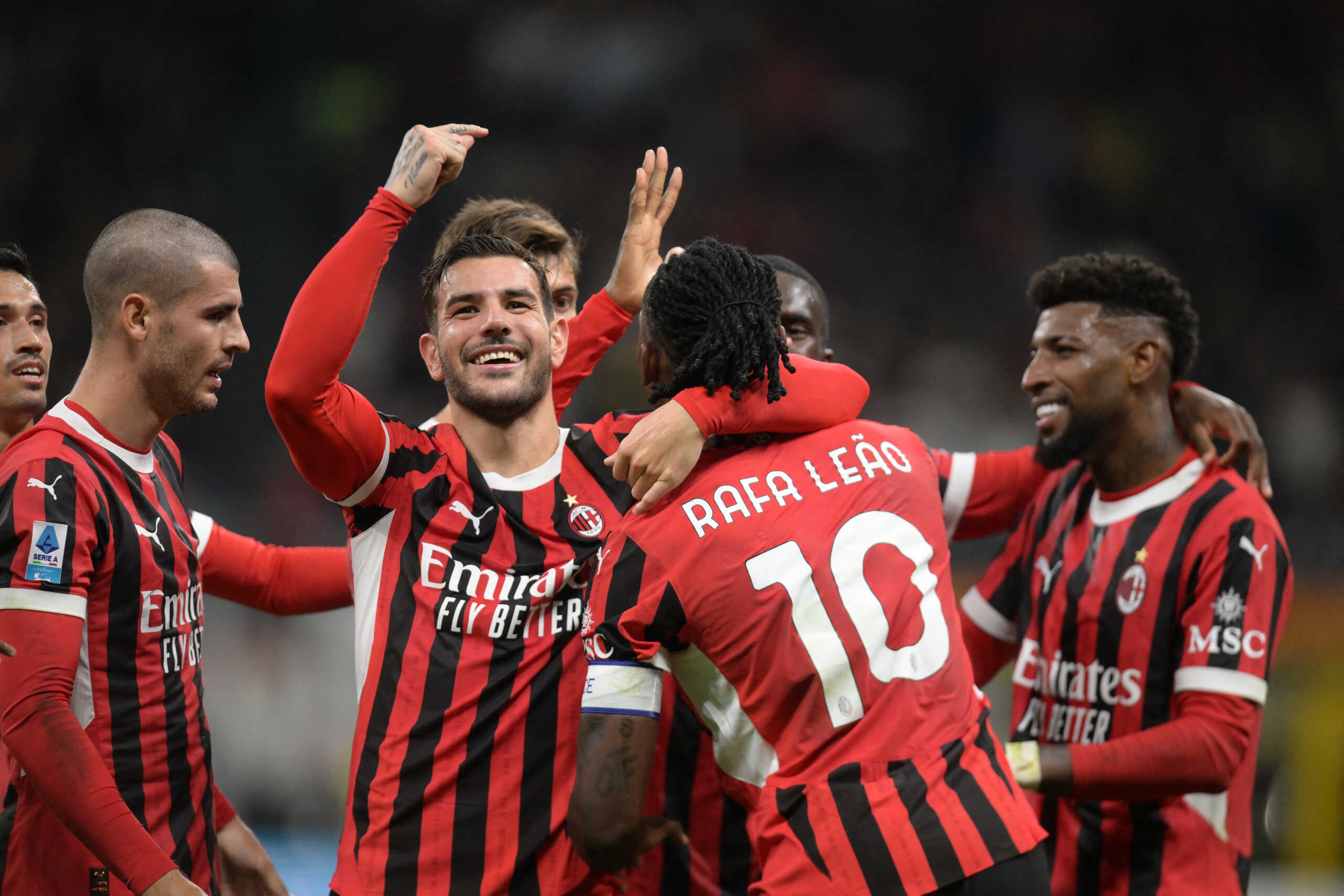 Soccer Football - Serie A - AC Milan v Lecce - San Siro, Milan, Italy - September 27, 2024 AC Milan's Theo Hernandez celebrates scoring their second goal with Rafael Leao REUTERS