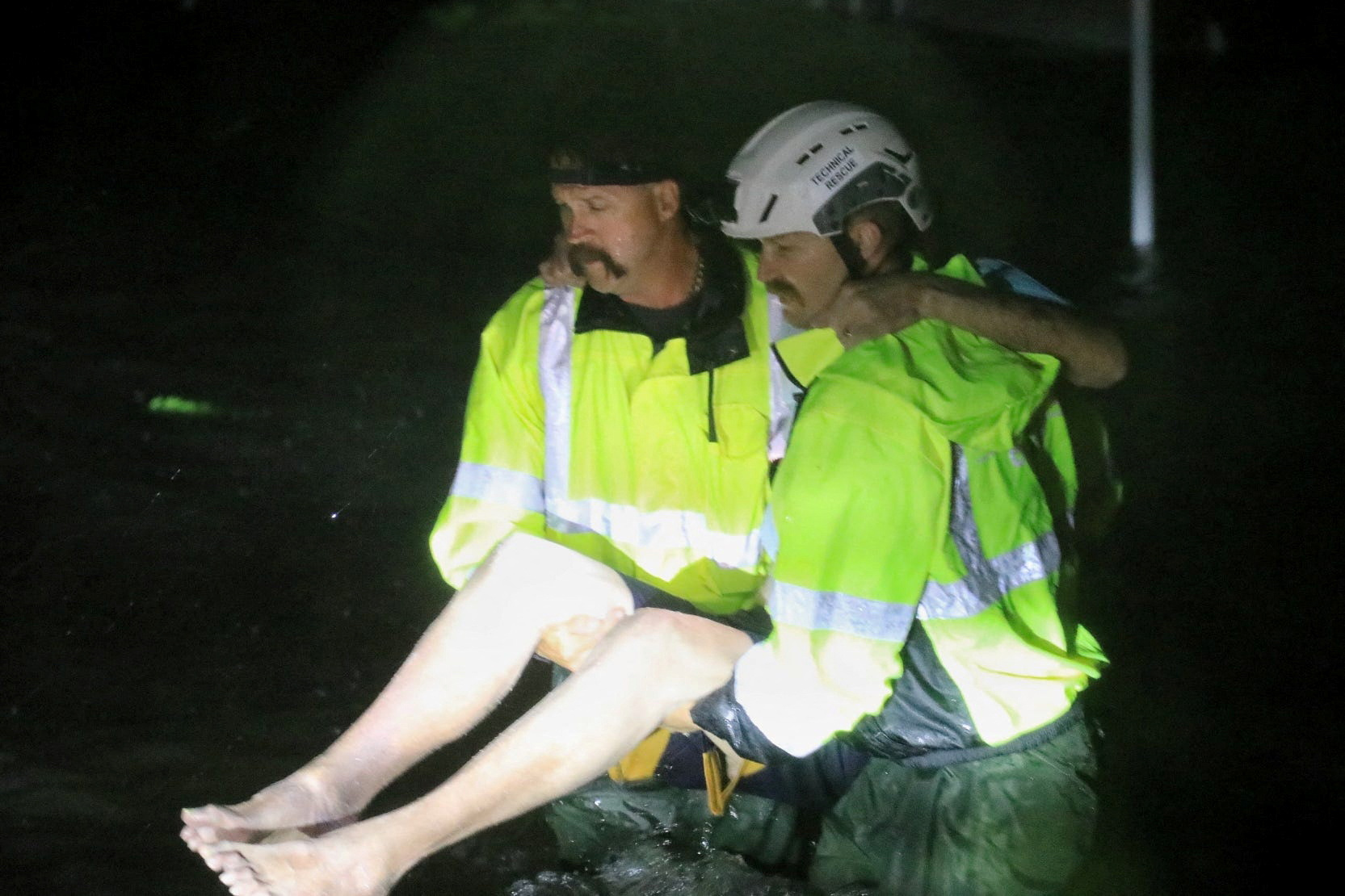 Volusia County Fire Rescue personnel respond to an emergency call in flood waters before dawn as Hurricane Milton moved through central Florida, in south Daytona, Florida, U.S. October 10, 2024.  Nadia Zomorodian