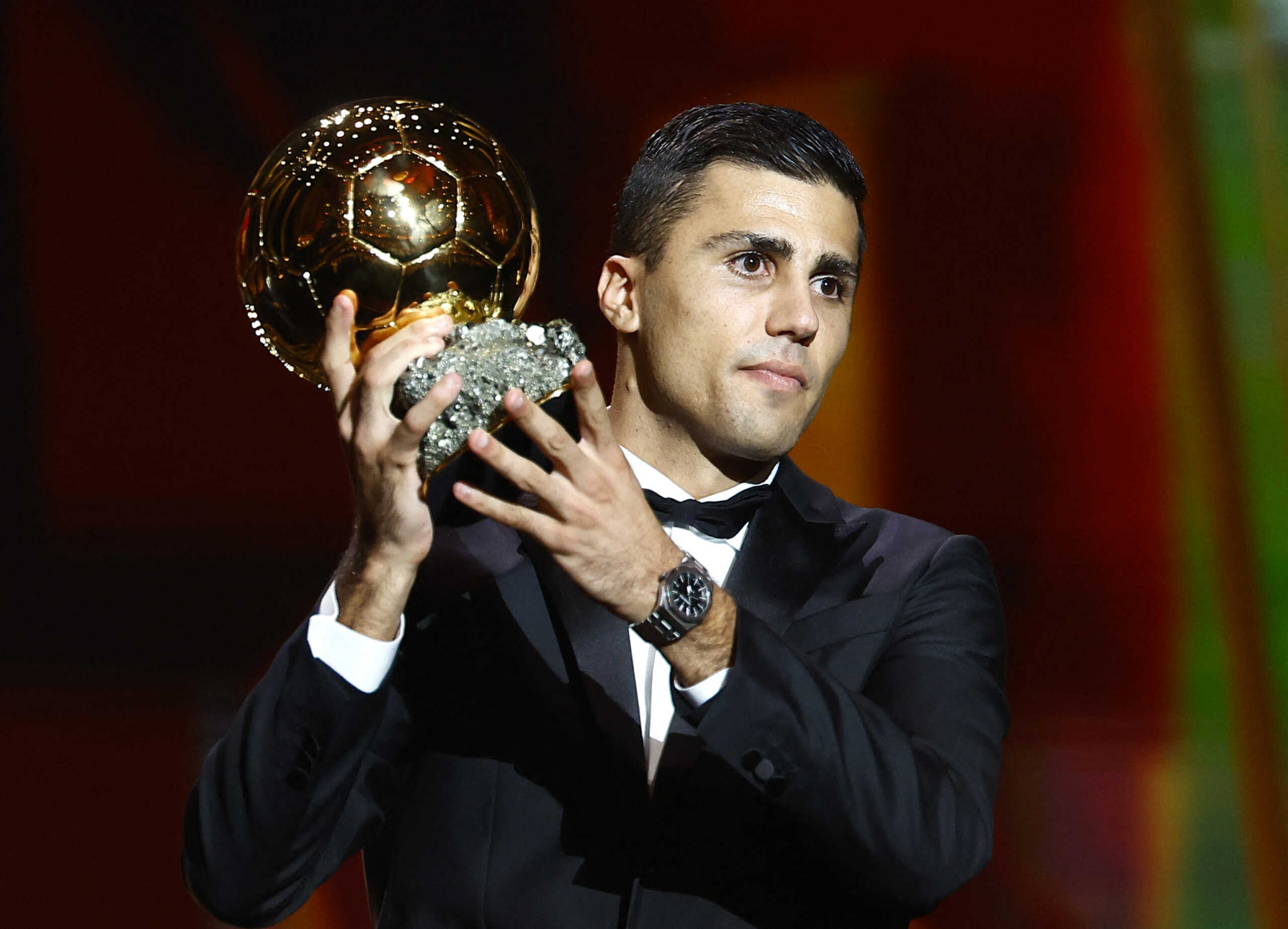 Soccer Football - Ballon d'Or - Theatre du Chatelet, Paris, France - October 28, 2024 Spain's and Manchester City's Rodri with the Ballon d'Or REUTERS