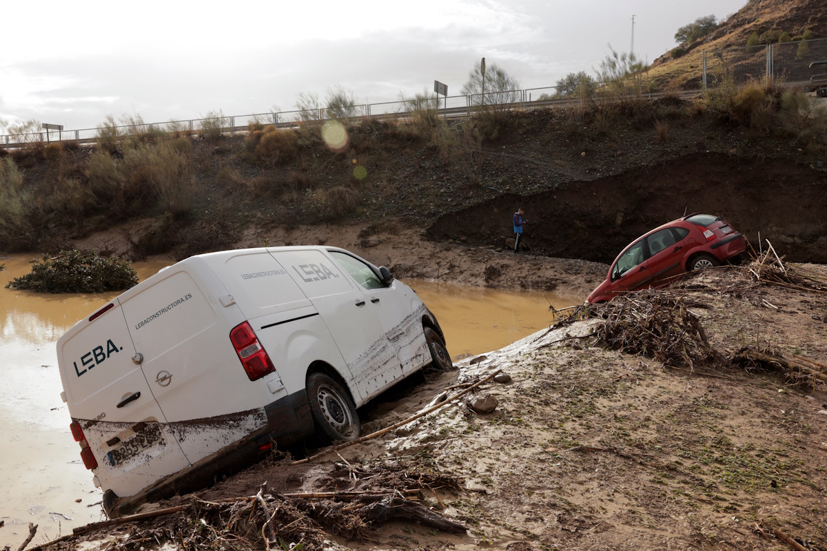 A man stands in a flooded area after heavy rains and floods in Alora, Spain October 29, 2024. REUTERS