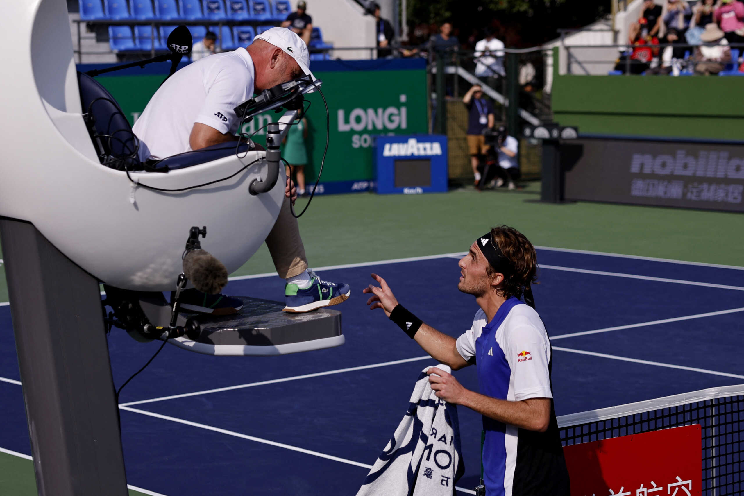 Tennis - Shanghai Masters - Qizhong Forest Sports City Arena, Shanghai, China - October 9, 2024 Greece's Stefanos Tsitsipas remonstrates with the umpire during his round of 16 match against Russia's Daniil Medvedev REUTERS