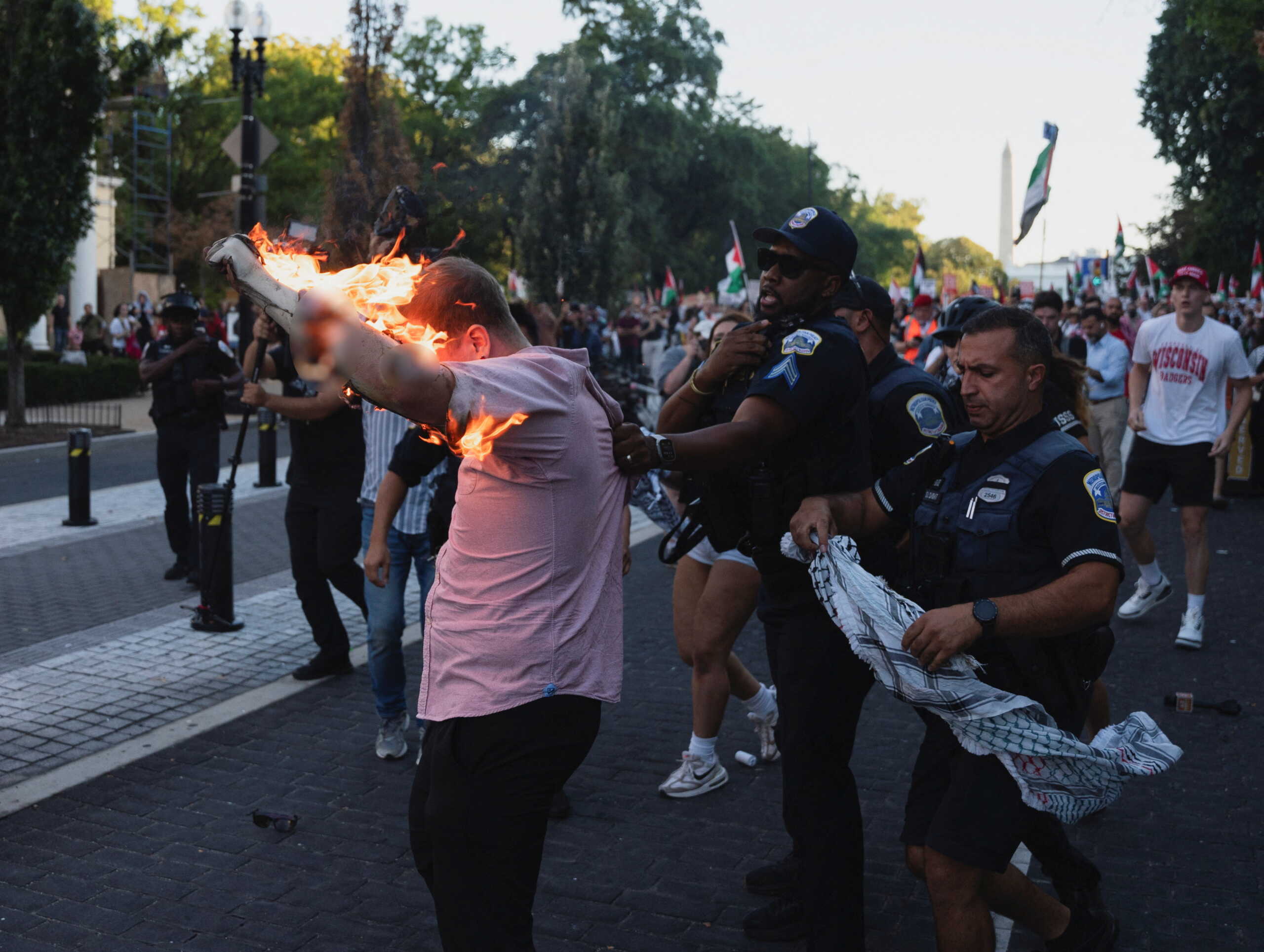 A journalist self immolates during a Pro-Palestinian protesters' rally ahead of the October 7 attack anniversary, amid the Israel-Hamas conflict, outside the White House in Washington, U.S., October 5, 2024. REUTERS