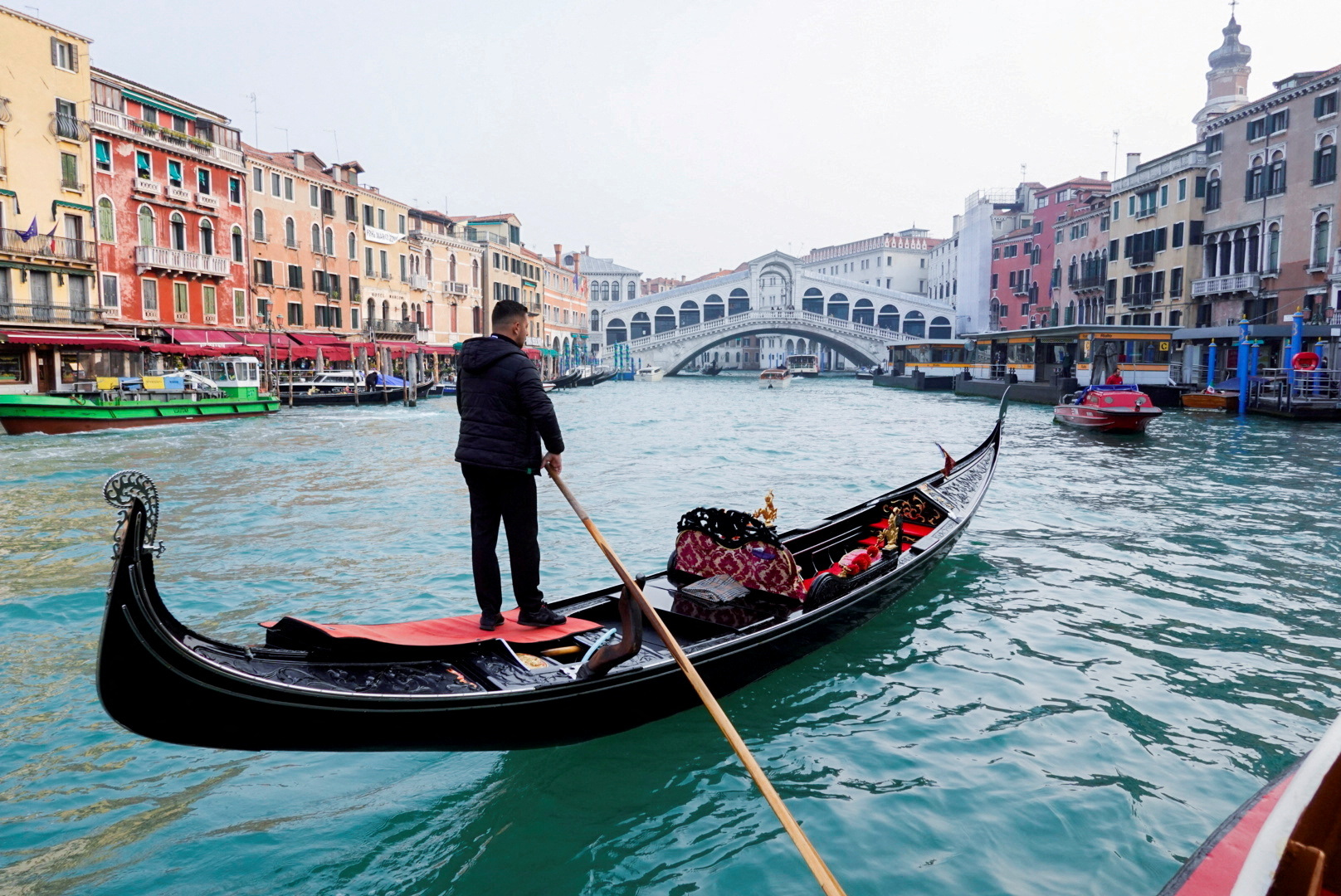 FILE PHOTO: A gondola is pictured on Grand Canal in front of Rialto bridge in Venice, Italy, October 20, 2021. REUTERS