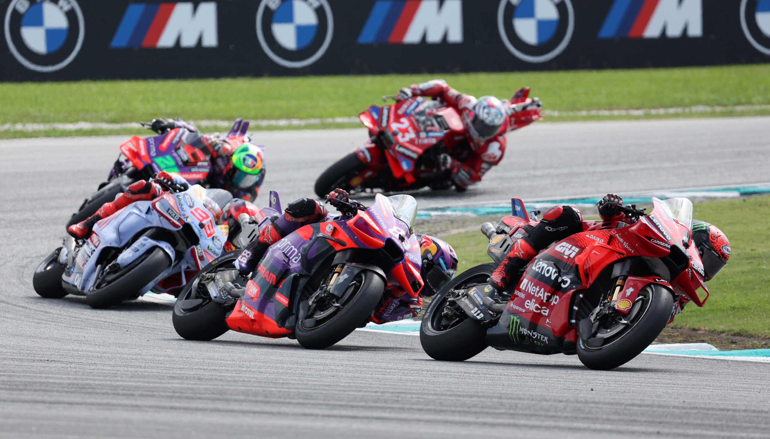 MotoGP - Malaysian Grand Prix - Sepang International Circuit, Sepang, Malaysia - November 3, 2024 Ducati Lenovo Team's Francesco Bagnaia, Prima Pramac Racing's Jorge Martin, Gresini Racing MotoGP's Marc Marquez and riders in action during the MotoGP REUTERS