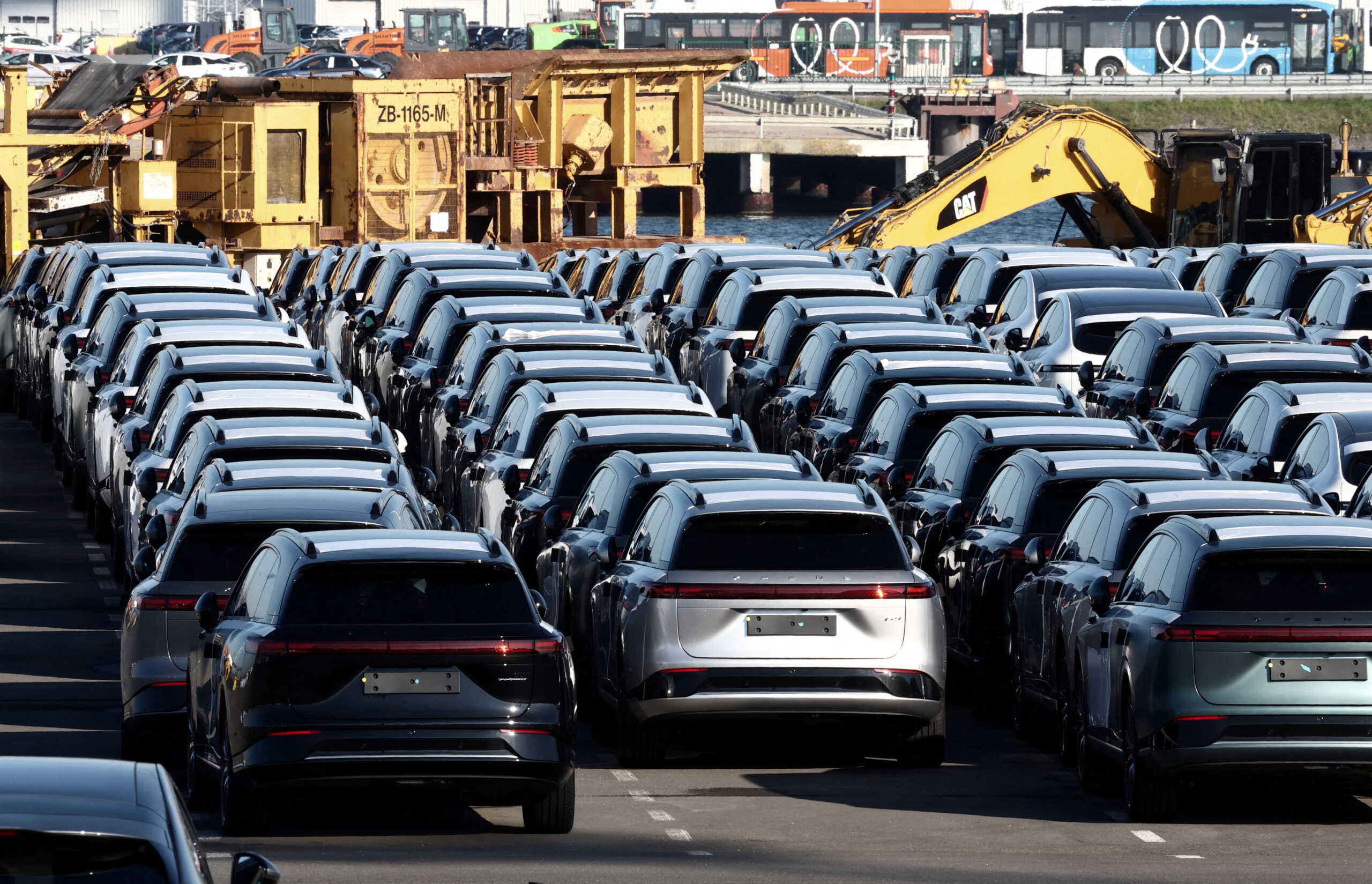 FILE PHOTO: New China-built electric vehicles of the company Xpeng are seen parked in the port of Zeebrugge, Belgium, October 24, 2024. REUTERS