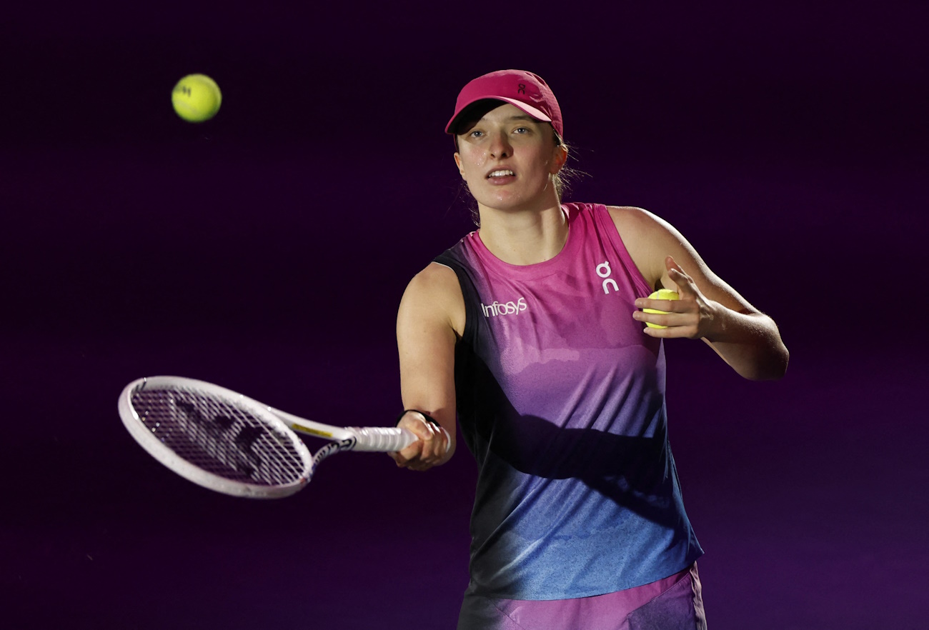 Tennis - WTA Finals - King Saud University Indoor Arena, Riyadh, Saudi Arabia - November 3, 2024 Poland's Iga Swiatek celebrates after winning her women's singles group stage match against Czech Republic's Barbora Krejcikova REUTERS