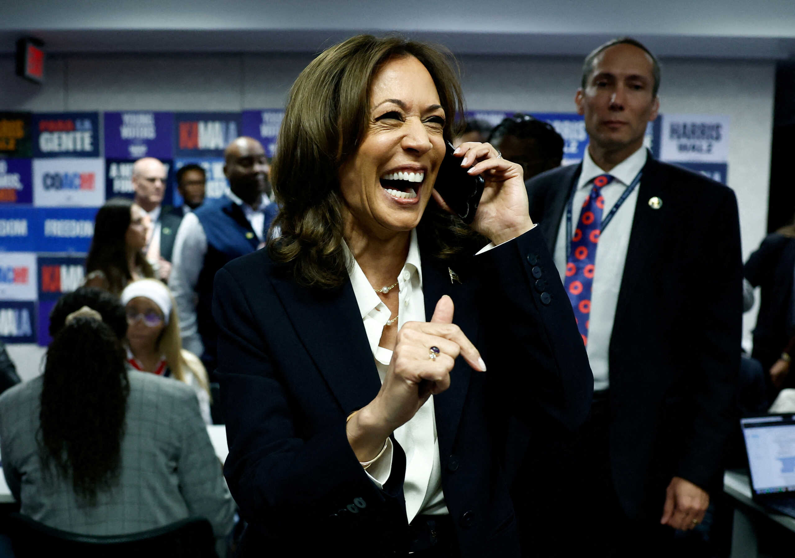 Democratic presidential nominee U.S. Vice President Kamala Harris calls voters in a last-minute campaign push at the Democratic National Committee (DNC) headquarters during the 2024 U.S. presidential election on Election Day in Washington, U.S., November 5, 2024. REUTERS