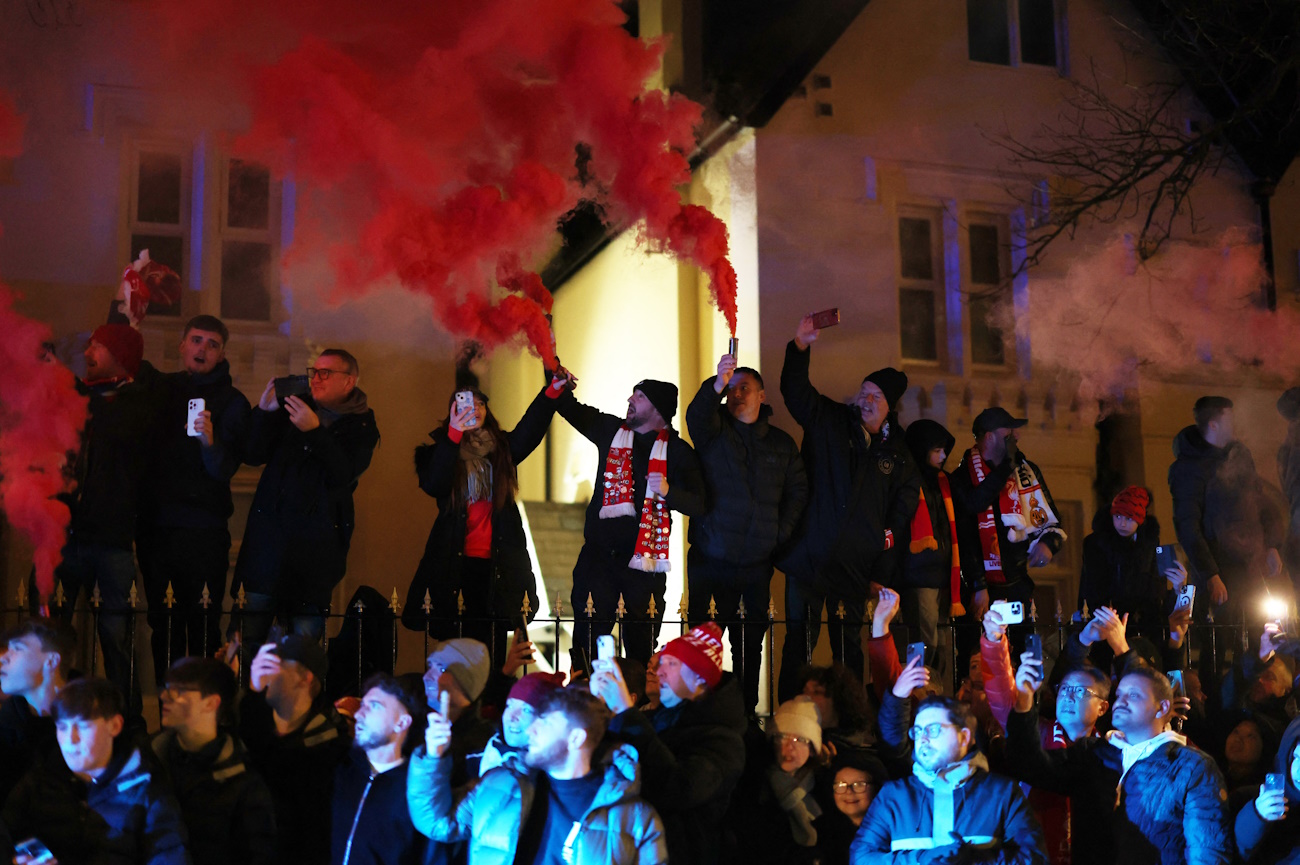 Soccer Football - Champions League - Liverpool v Real Madrid - Anfield, Liverpool, Britain - November 27, 2024  Liverpool fans with flares outside the stadium before the match Action Images via Reuters