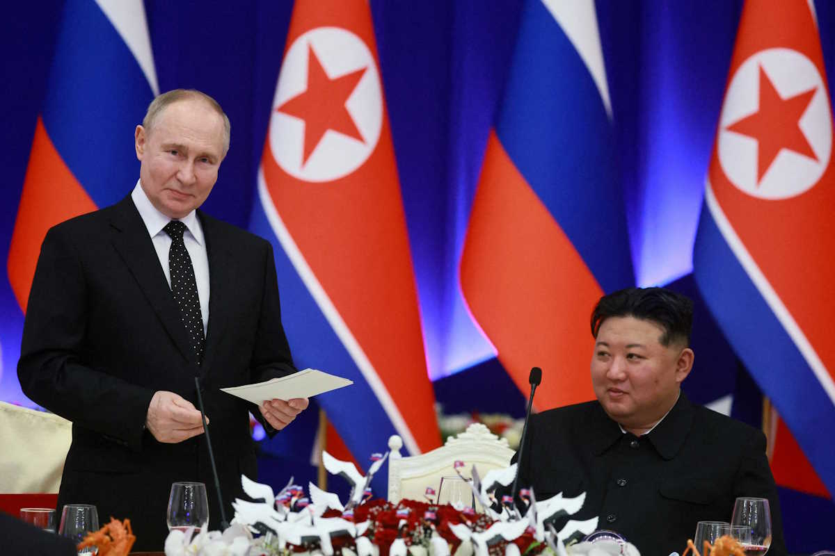 FILE PHOTO: Russia's President Vladimir Putin and North Korea's leader Kim Jong Un attend a state reception in Pyongyang, North Korea June 19, 2024. Sputnik