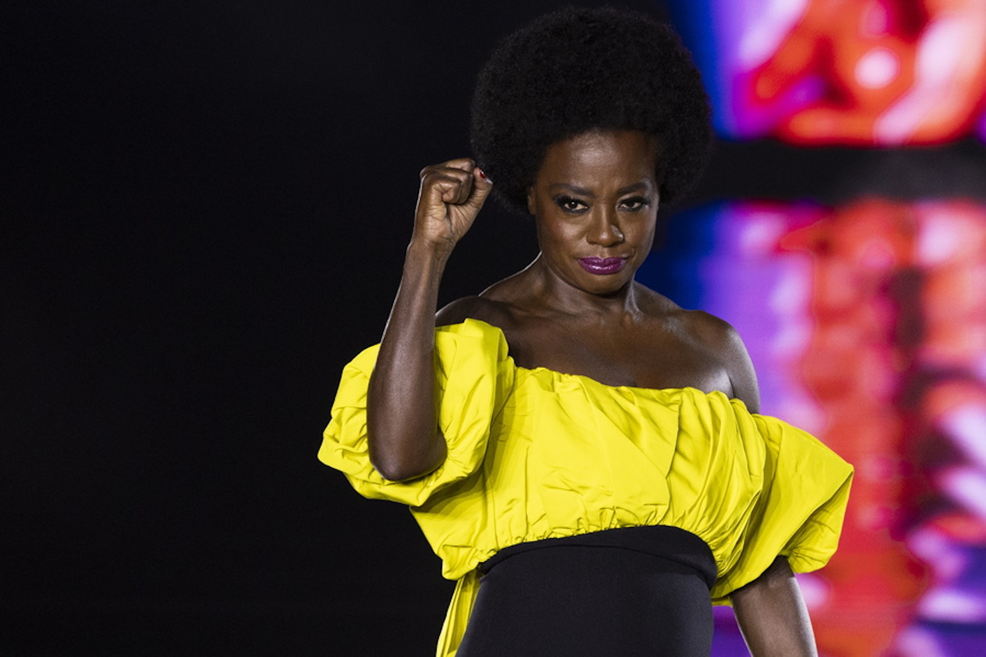 epa11621601 US actress Viola Davis raises her fist as she presents a creation during the Womenswear Spring