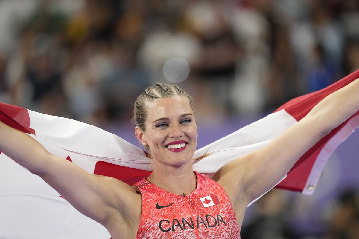 Alysha Newman, of Canada, celebrates third place after the women's pole vault final at the 2024 Summer Olympics, Wednesday, Aug. 7, 2024, in Saint-Denis, France. (AP Photo