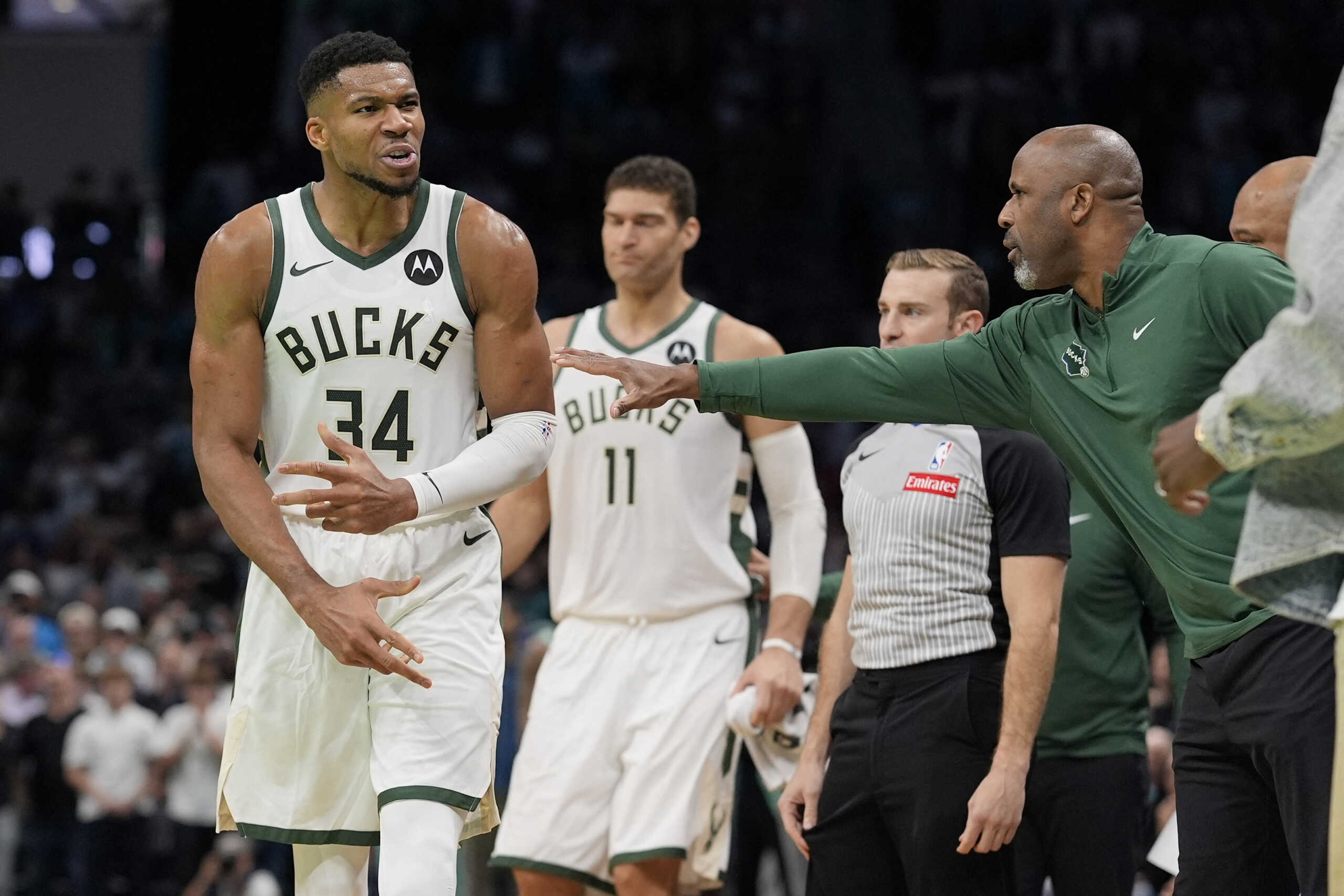 Nov 16, 2024; Charlotte, North Carolina, USA;  Milwaukee Bucks forward Giannis Antetokounmpo (34) reacts to a call  during the second half against the Charlotte Hornets at Spectrum Center. Mandatory Credit: Jim Dedmon-Imagn Images