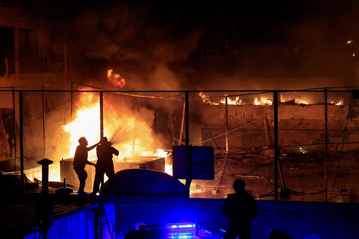 Firefighters work to extinguish a fire at the site of an Israeli strike in Beirut's Mar Elias street, Lebanon November 17, 2024. REUTERS