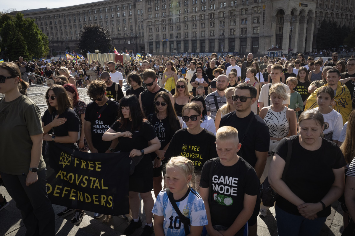 People attend a rally demanding to free Ukrainian prisoners of war who are held in captivity in Russia, at Independence Square in Kyiv, Ukraine, Sunday, July 28, 2024. Several thousand people and soldiers gathered to commemorate the second anniversary of a Russia-orchestrated explosion that killed more than 50 Ukrainian prisoners of war in the Russian-held Olenivka prison barracks. (AP Photo