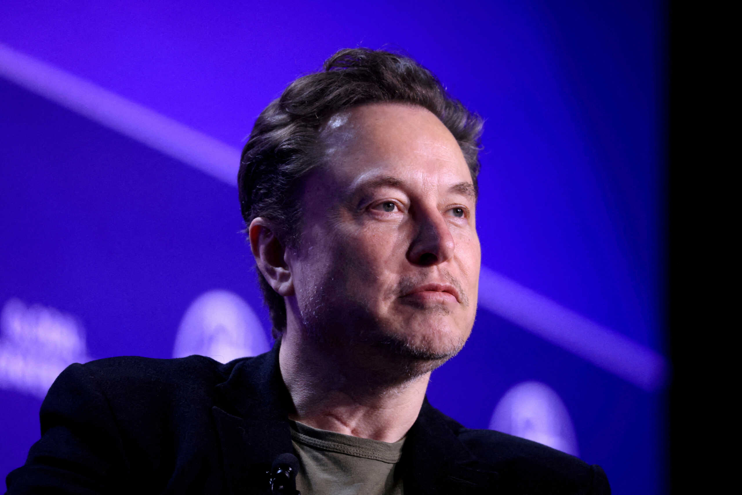 FILE PHOTO: Elon Musk, Chief Executive Officer of SpaceX and Tesla and owner of X looks on during the Milken Conference 2024 Global Conference Sessions at The Beverly Hilton in Beverly Hills, California, U.S., May 6, 2024.  REUTERS