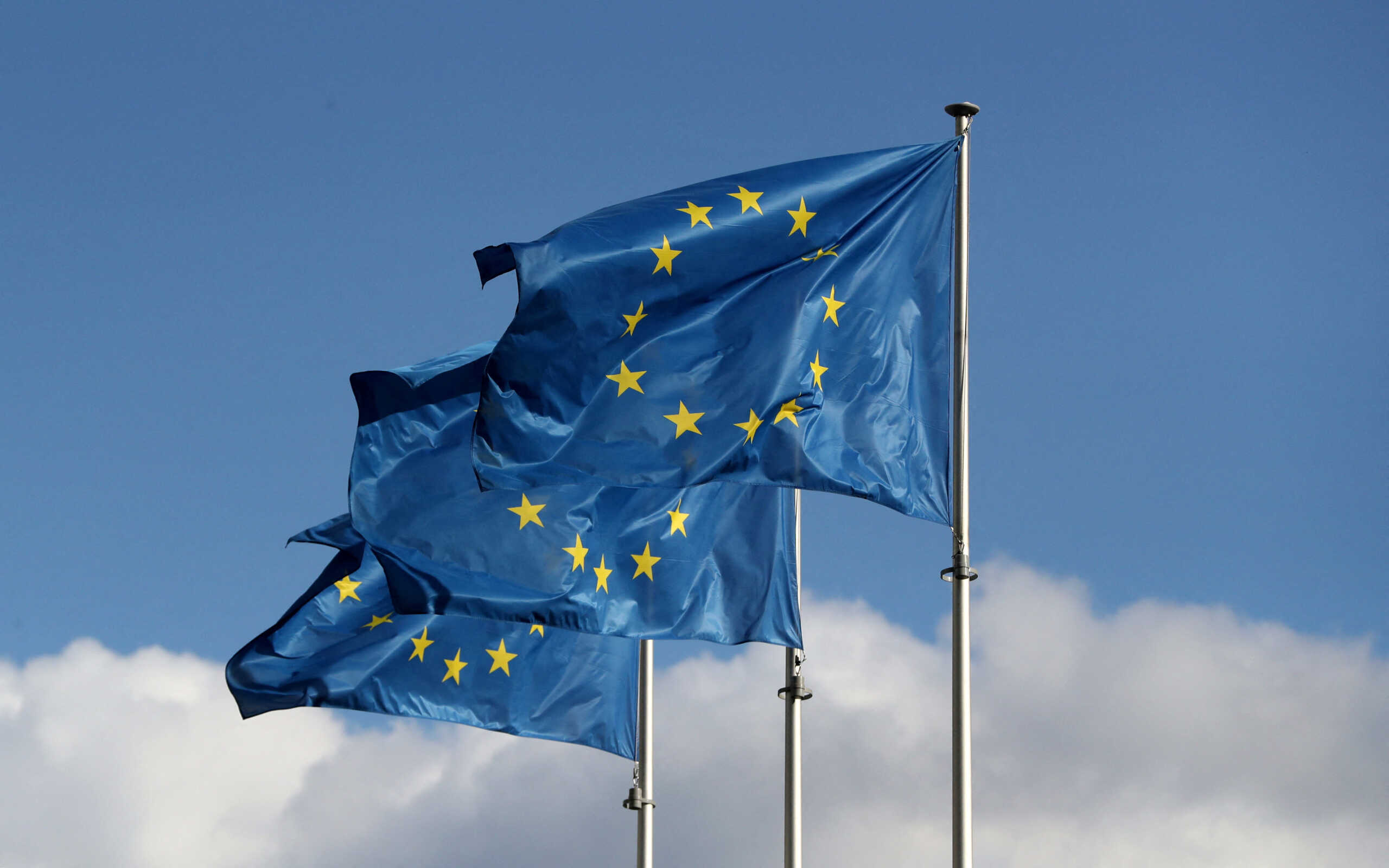 FILE PHOTO: European Union flags fly outside the EU Commission headquarters in Brussels, Belgium September 19, 2019. REUTERS