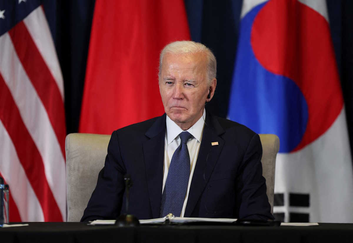 U.S. President Joe Biden participates in a trilateral meeting with South Korea's President Yoon Suk Yeol and Japan's Prime Minister Shigeru Ishiba at the Asia-Pacific Economic Cooperation (APEC) summit in Lima, Peru, November 15, 2024. REUTERS